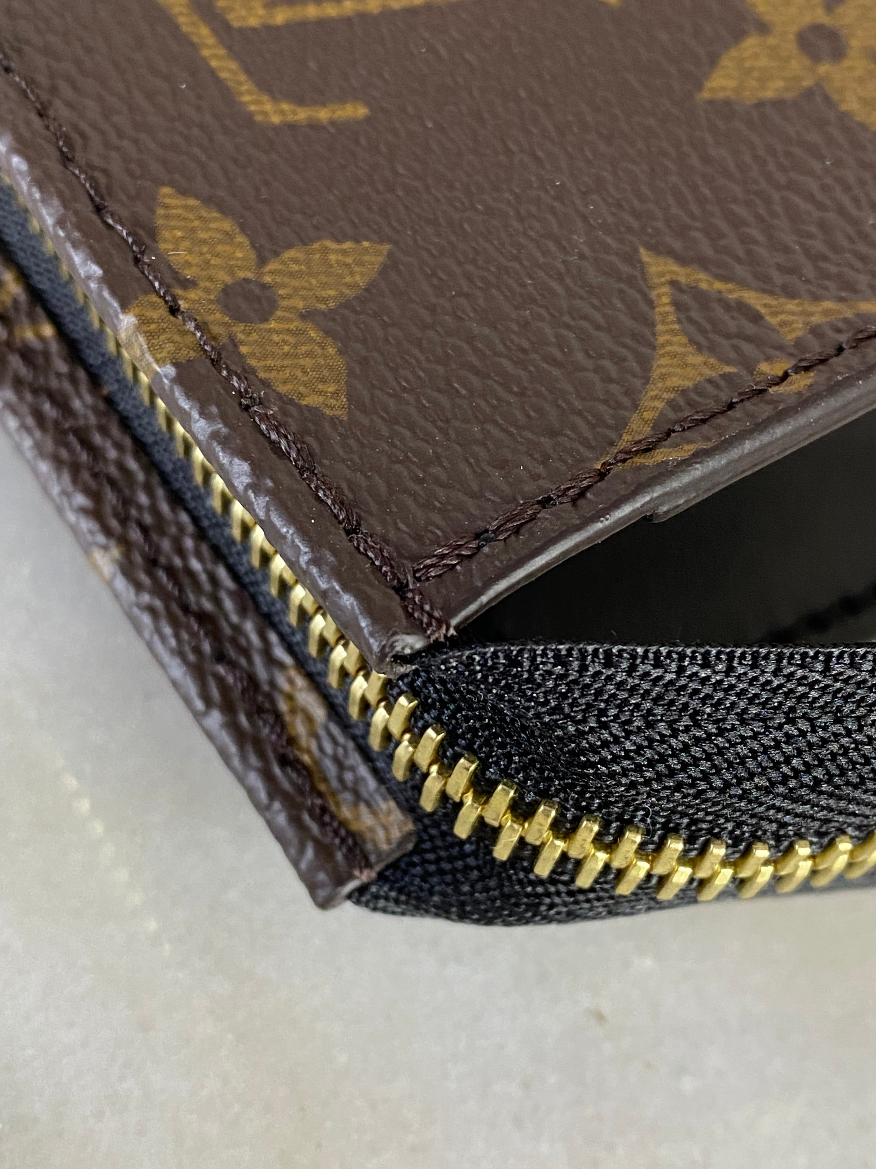 Louis Vuitton Monogram Zip Clutch-Clutch-Louis Vuitton-The Closet Egypt