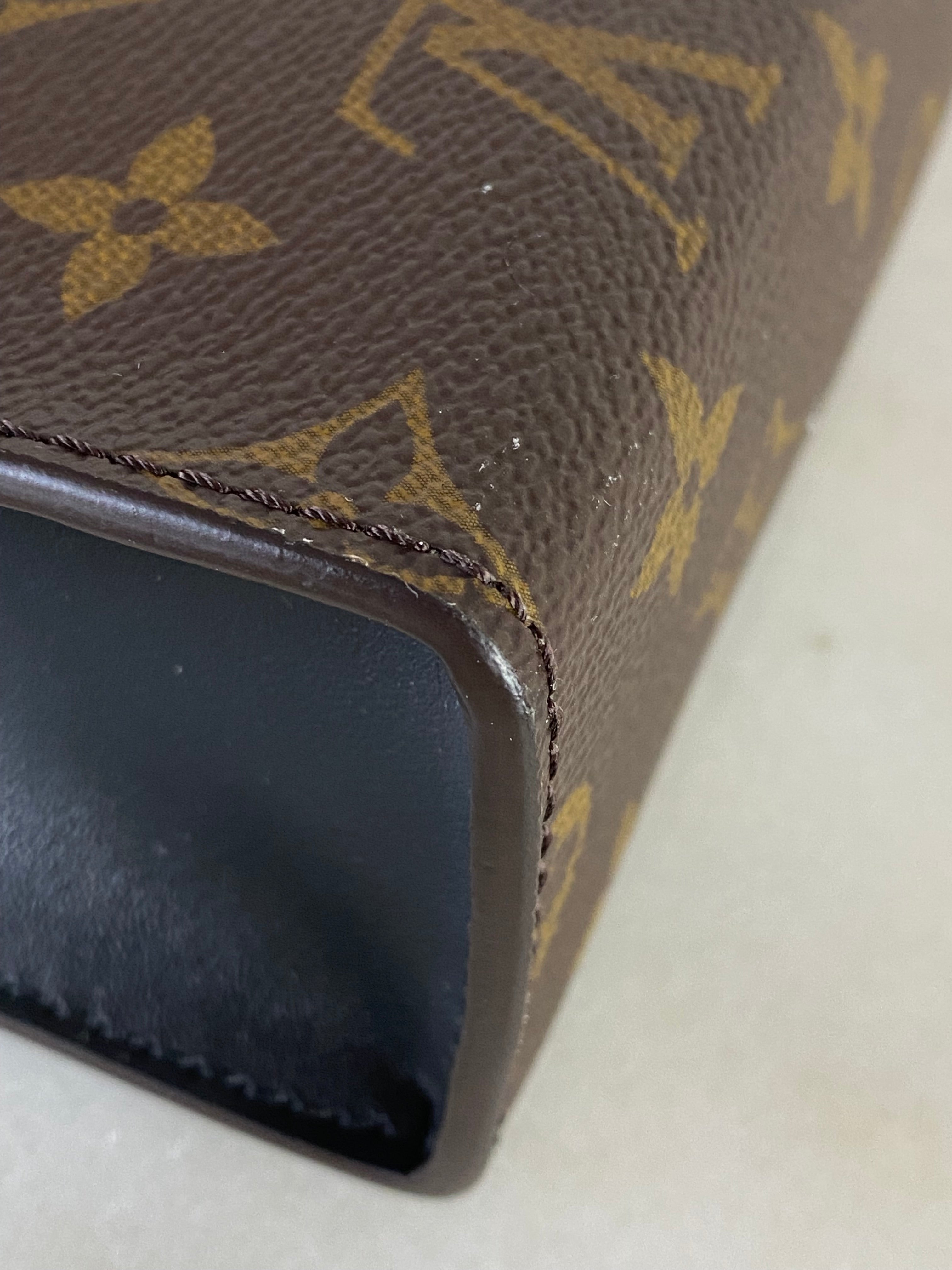 Louis Vuitton Monogram Zip Clutch-Clutch-Louis Vuitton-The Closet Egypt