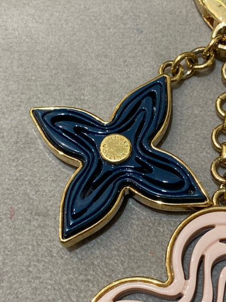 Louis Vuitton Gold Tone Resin Naif Bag Charm Key Holder