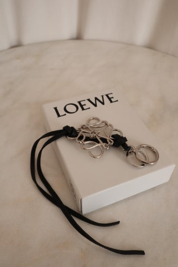 Louis Vuitton Silver Tone Knot offers Bag Charm Keychain