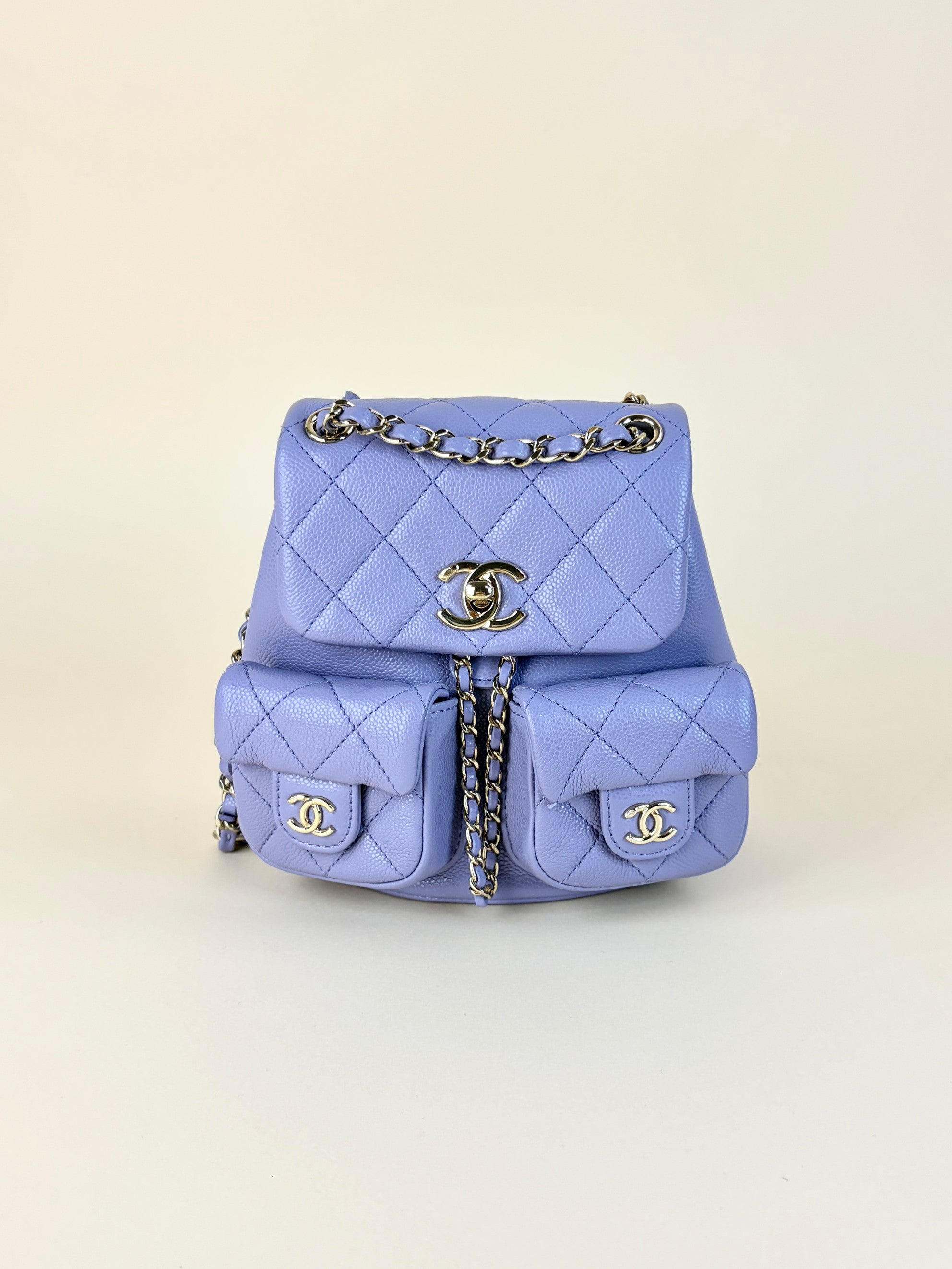 Chanel shiny caviar quilted small duma pockets drawstring backpack