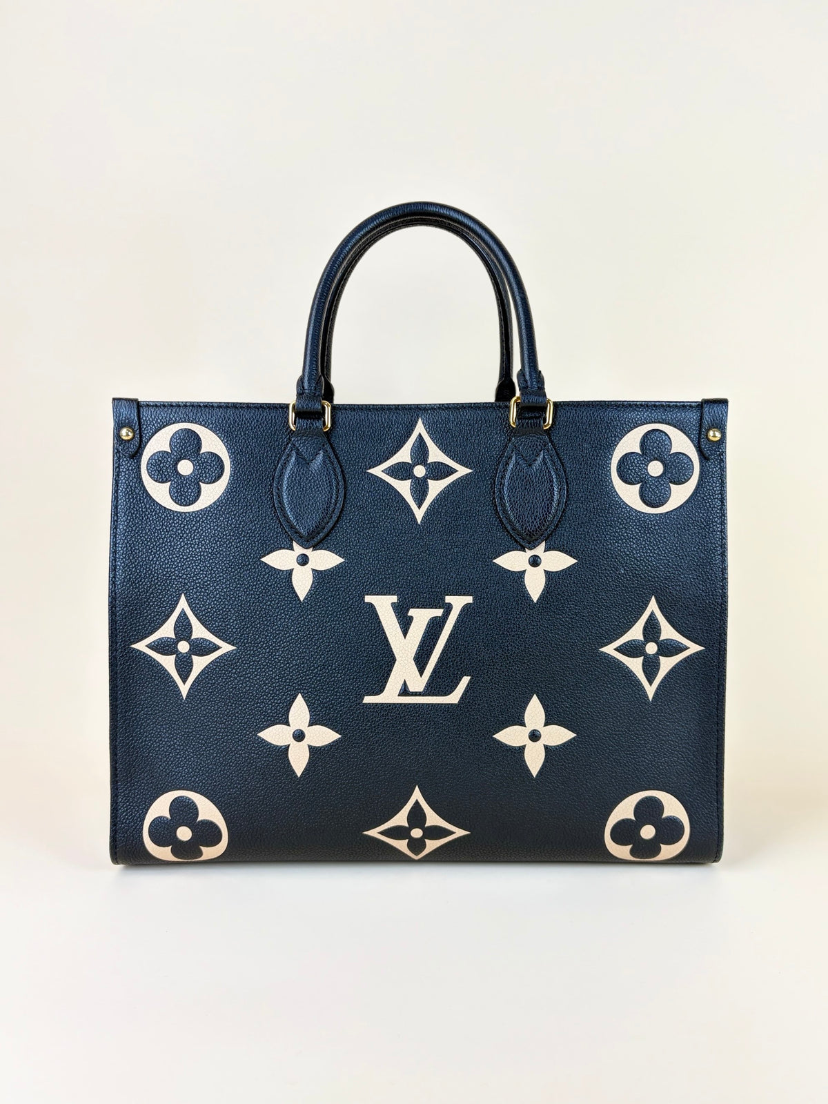 Louis Vuitton bicolor Monogram giant empriente on the go mm bag