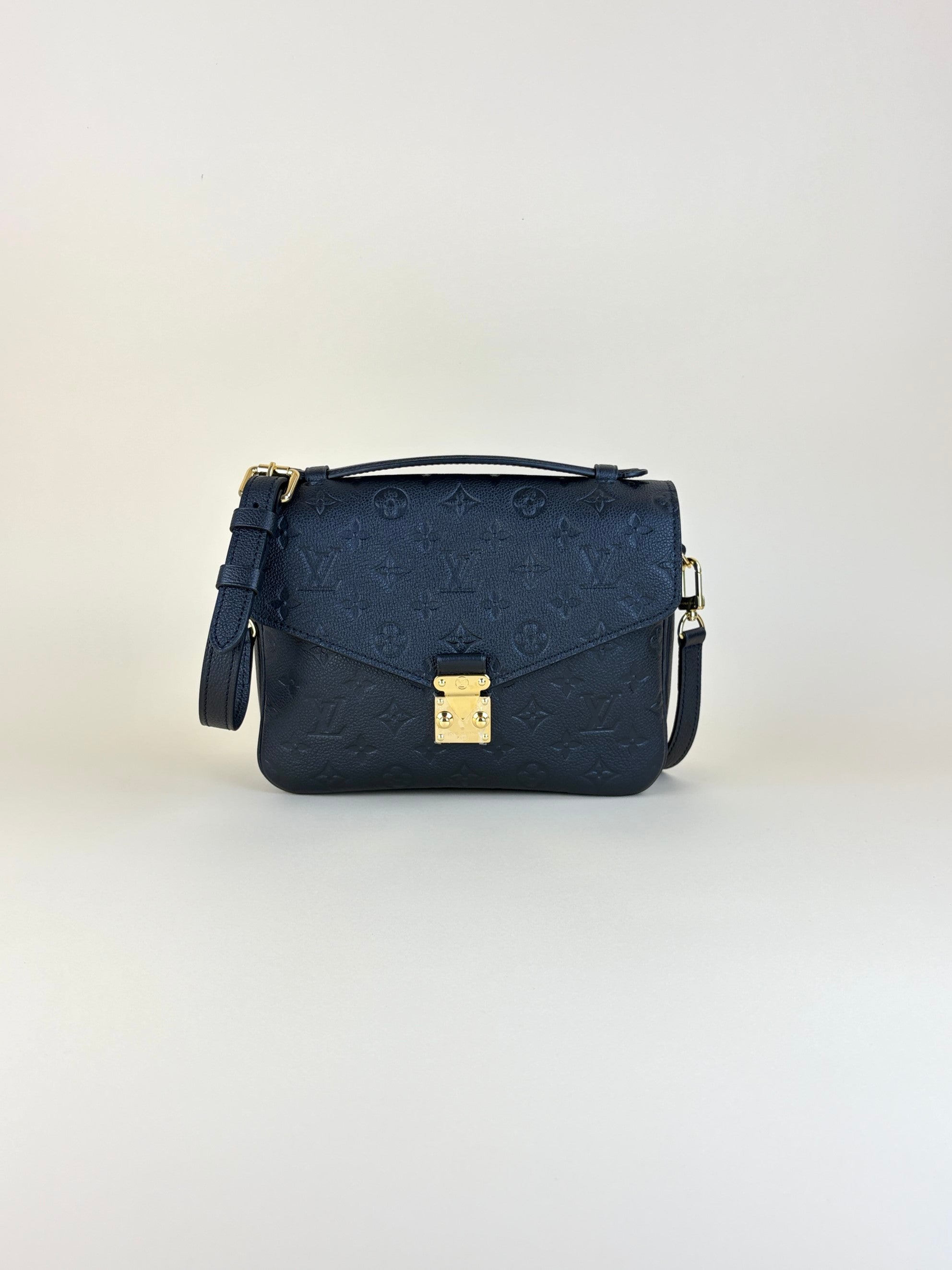 louis Vuitton black pochette Metis monogram imprinted leather
