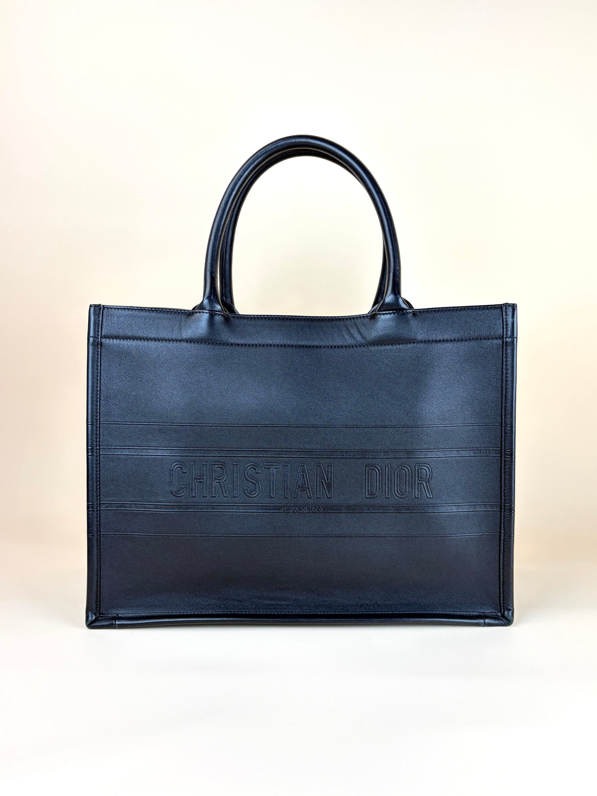Christian Dior medium black calfskin embossed book tote bag