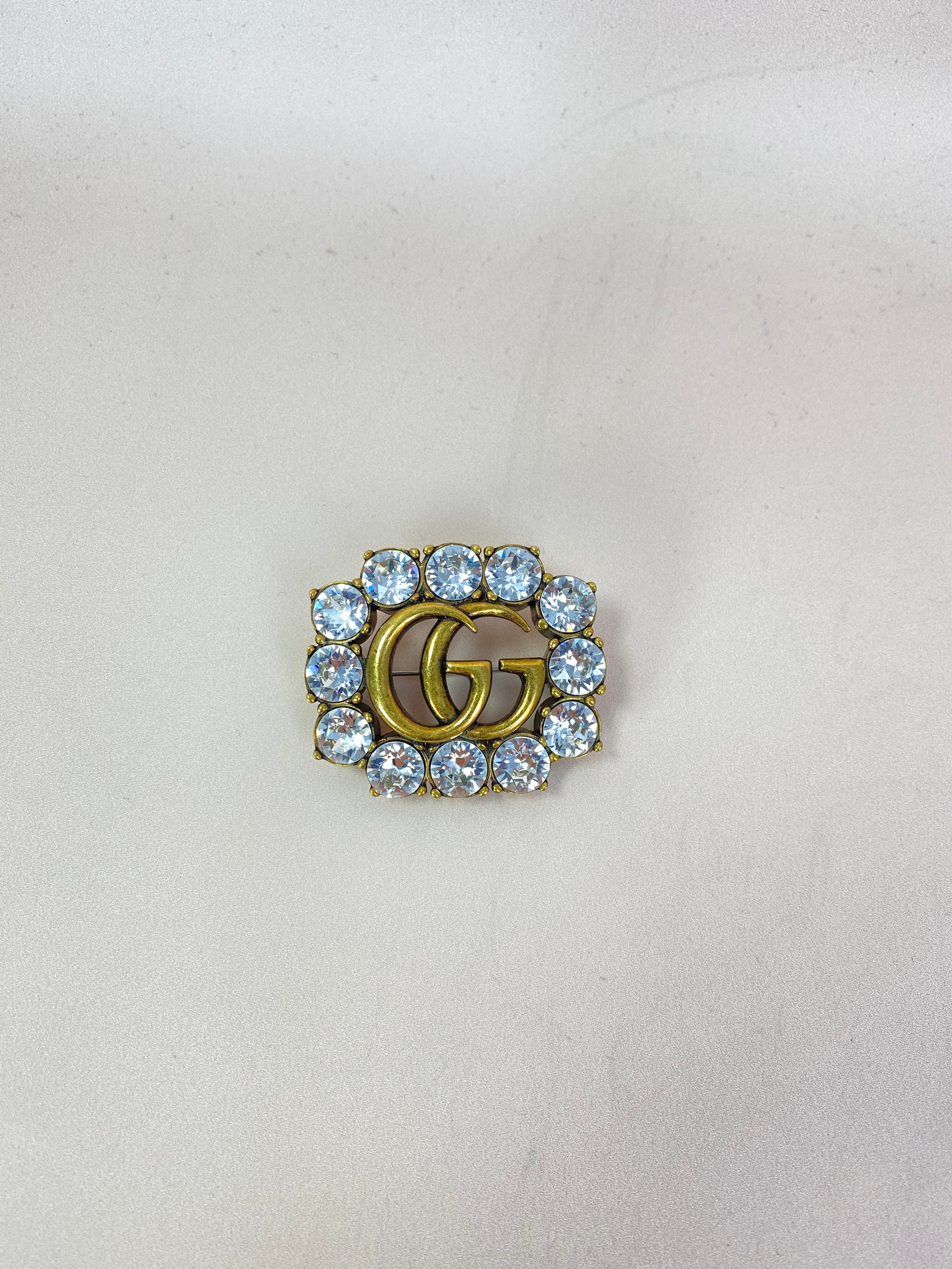 グッチ GUCCI GG ブローチ クリスタル ゴールド Double G crystal flower brooch in antique gold-toned metal