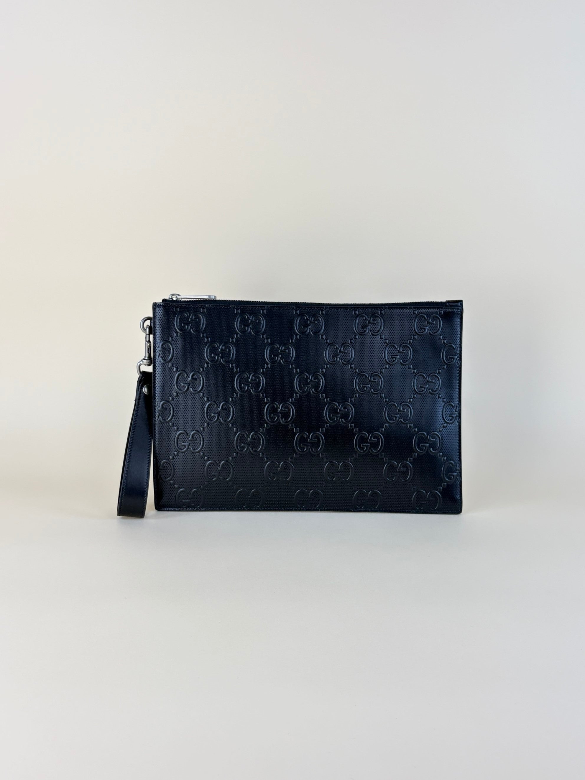 Gucci Black GG Tennis Embossed Wristlet Pouch