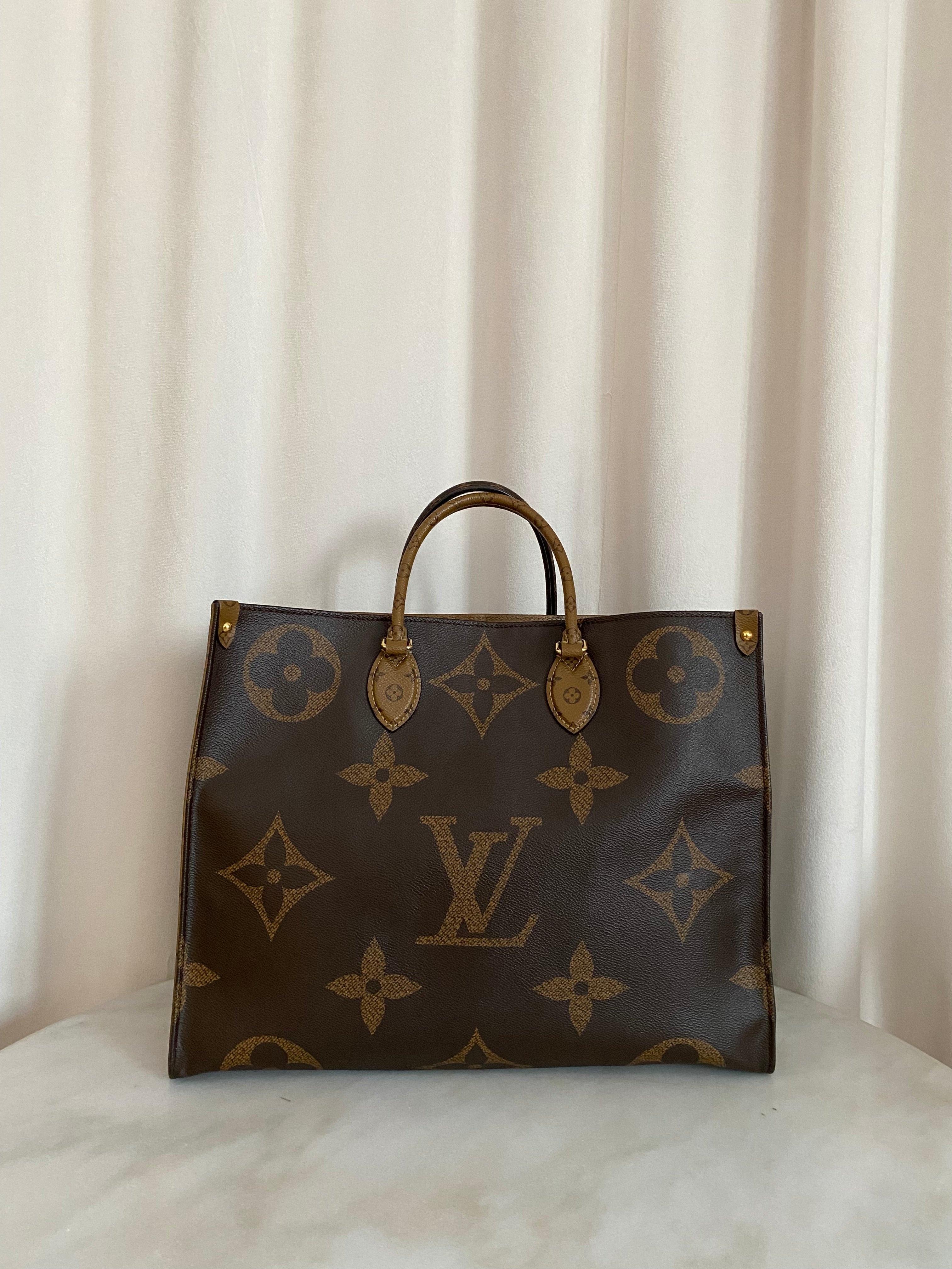 Louis Vuitton Monogram Reverse Onthego GM Bag