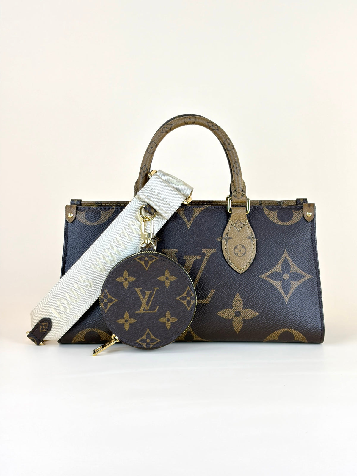 Louis Vuitton monogram reverse canvas on the go east-west tote bag