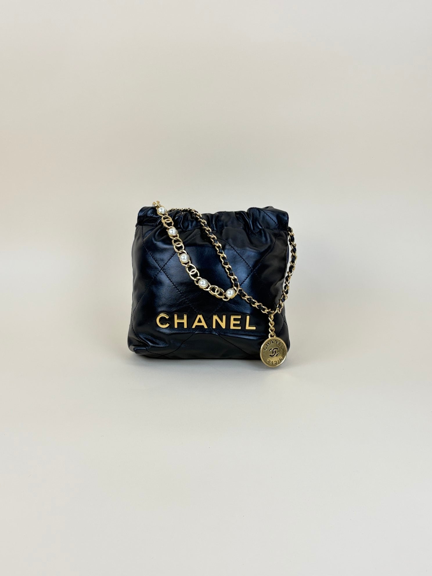 Chanel black shiny calfskin quilted pearl cc chain mini bag