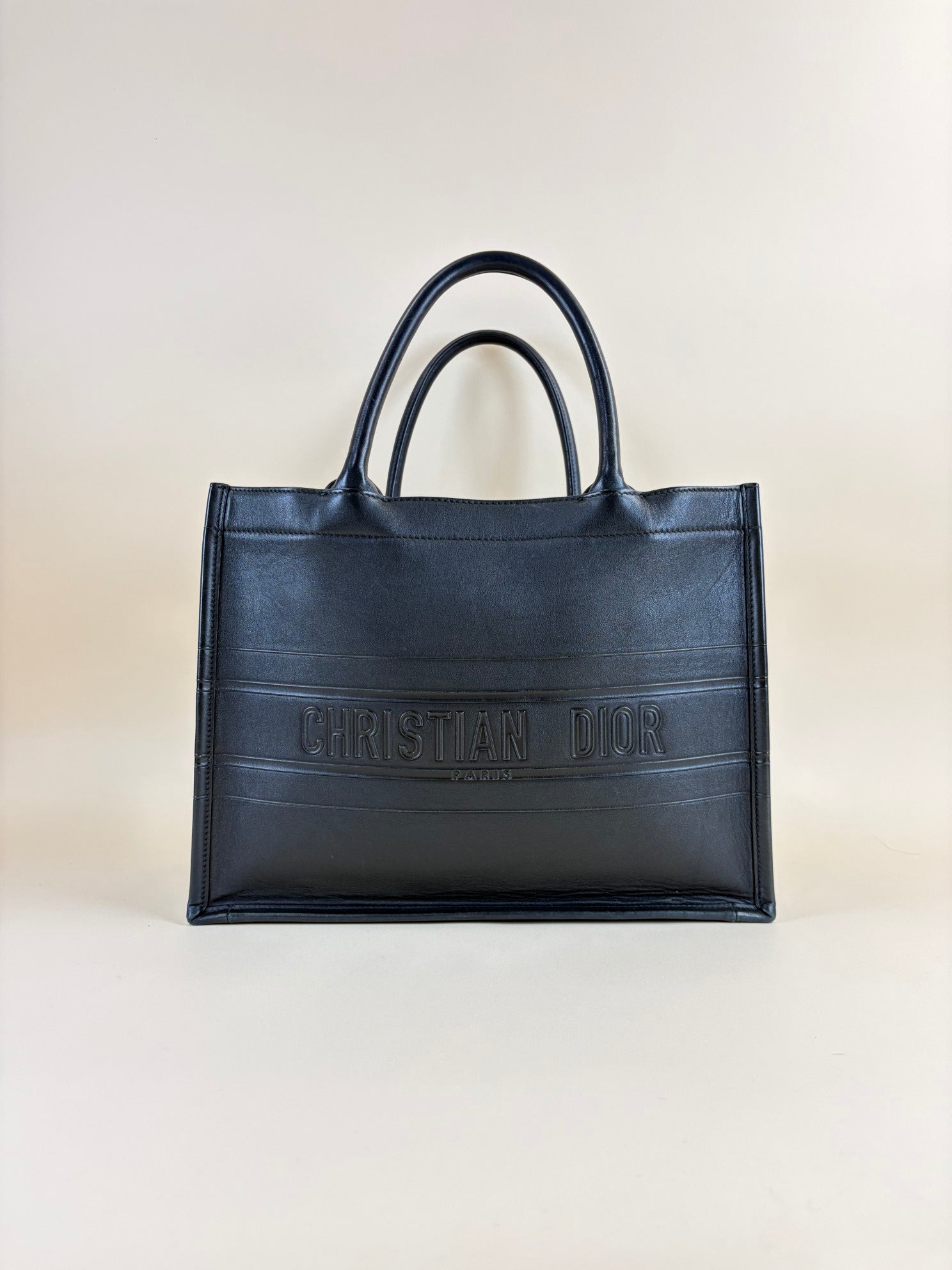Christian Dior medium black calfskin embossed book tote bag