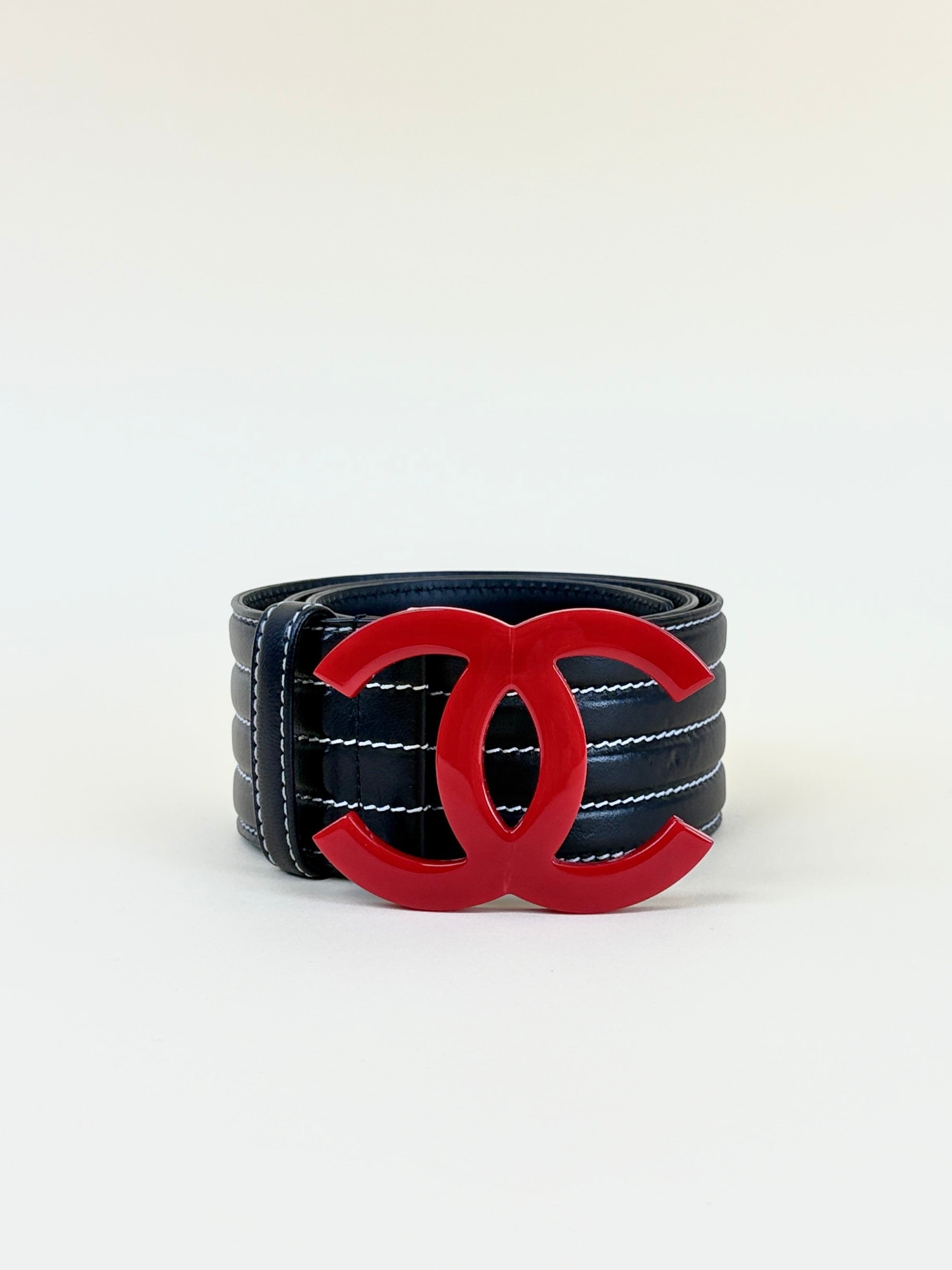 CHANEL black leather belt stitched red cc resin buckle logo