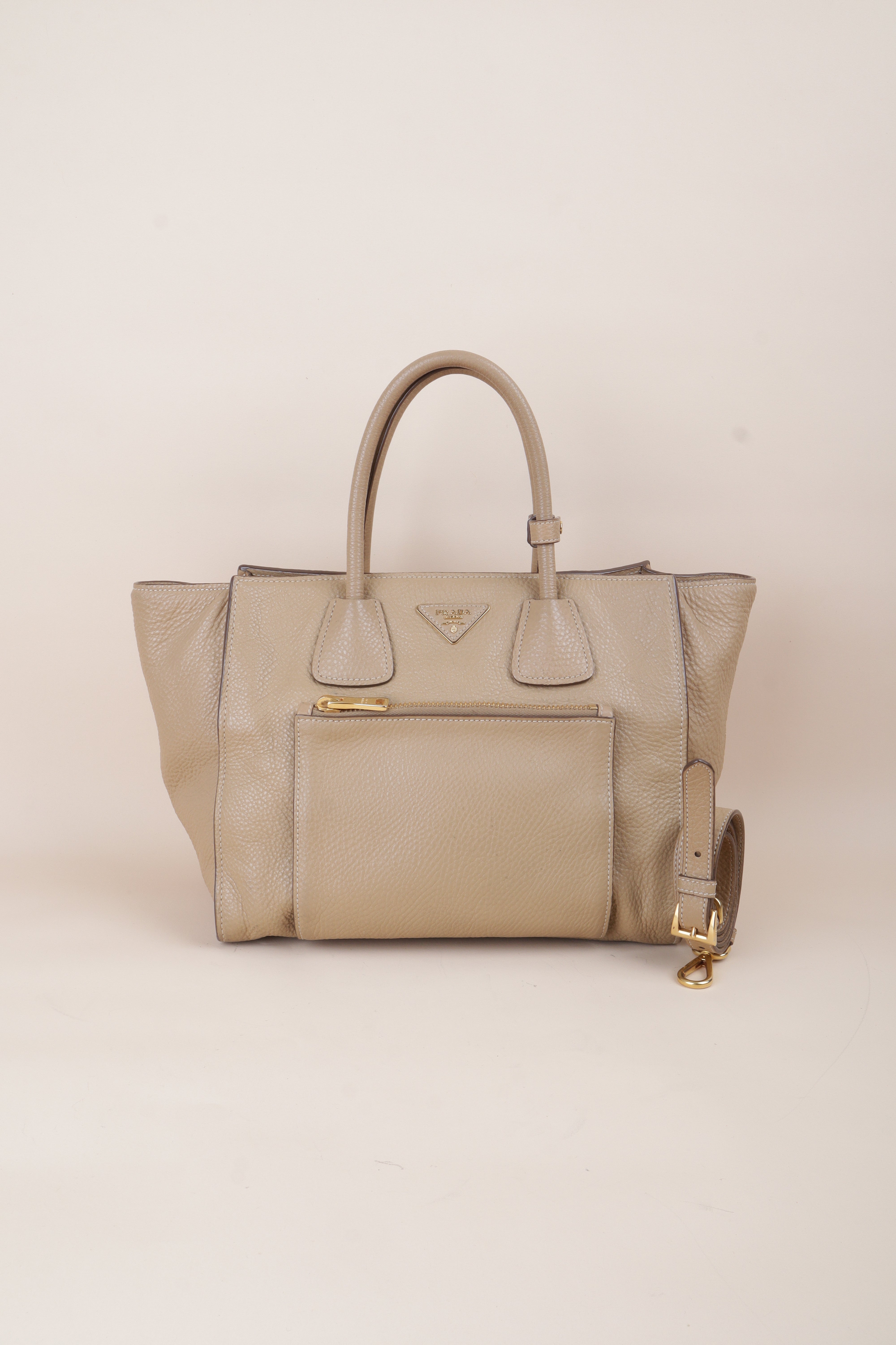 Prada beige front pocket wing convertible