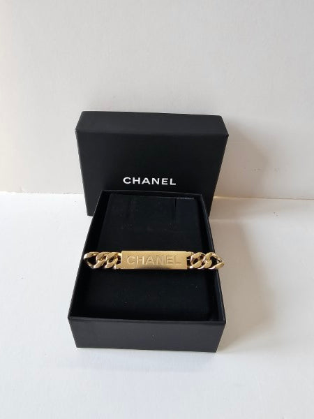 Chanel Gold Word Brooch