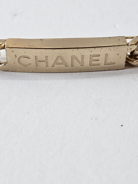 Chanel Gold Word Brooch