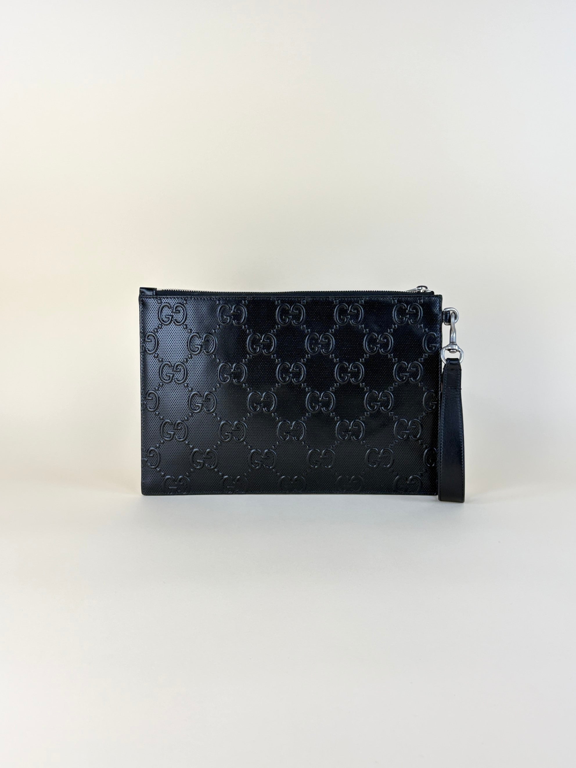 Gucci Black GG Tennis Embossed Wristlet Pouch