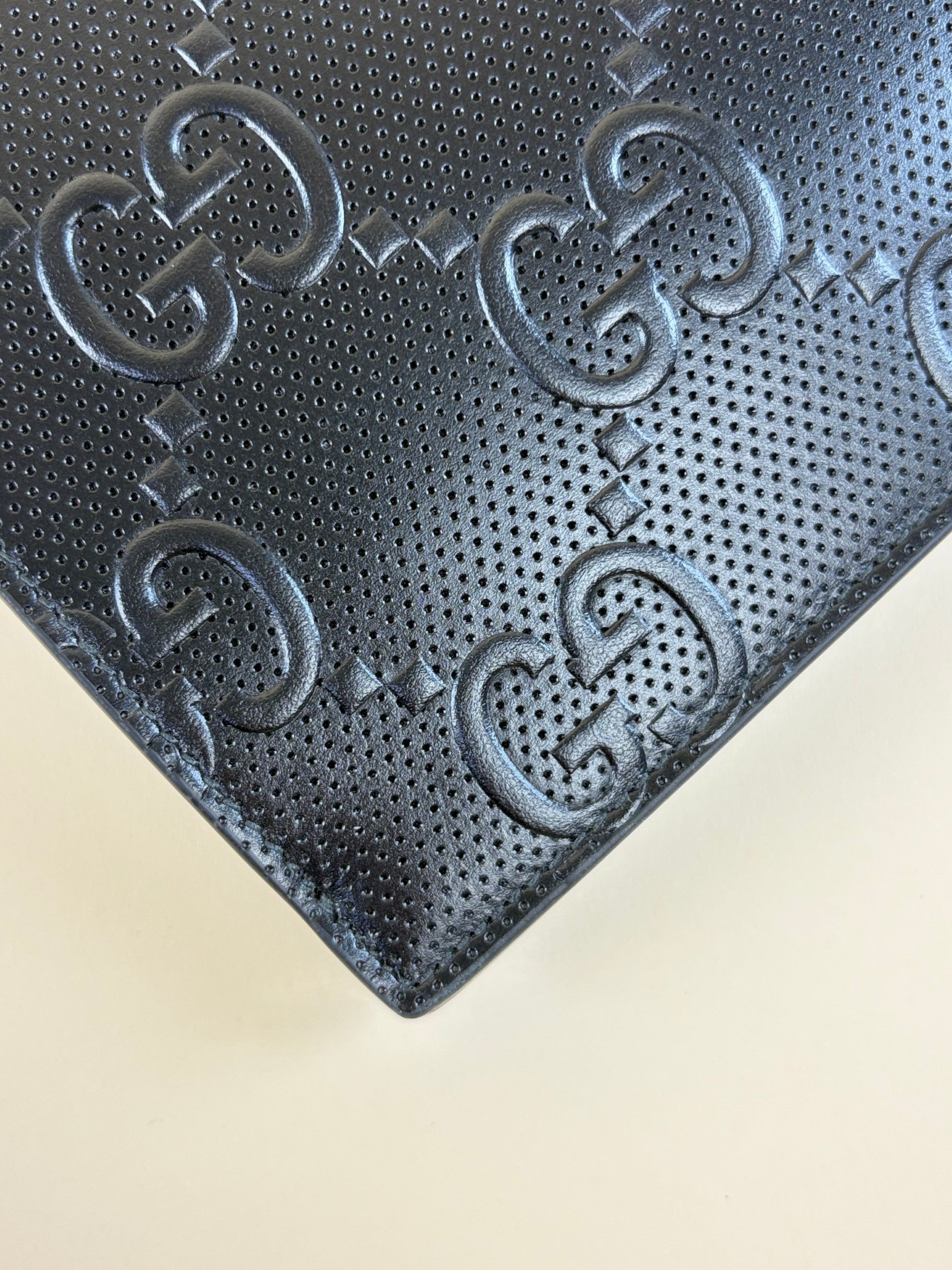 Gucci Black GG Tennis Embossed Wristlet Pouch