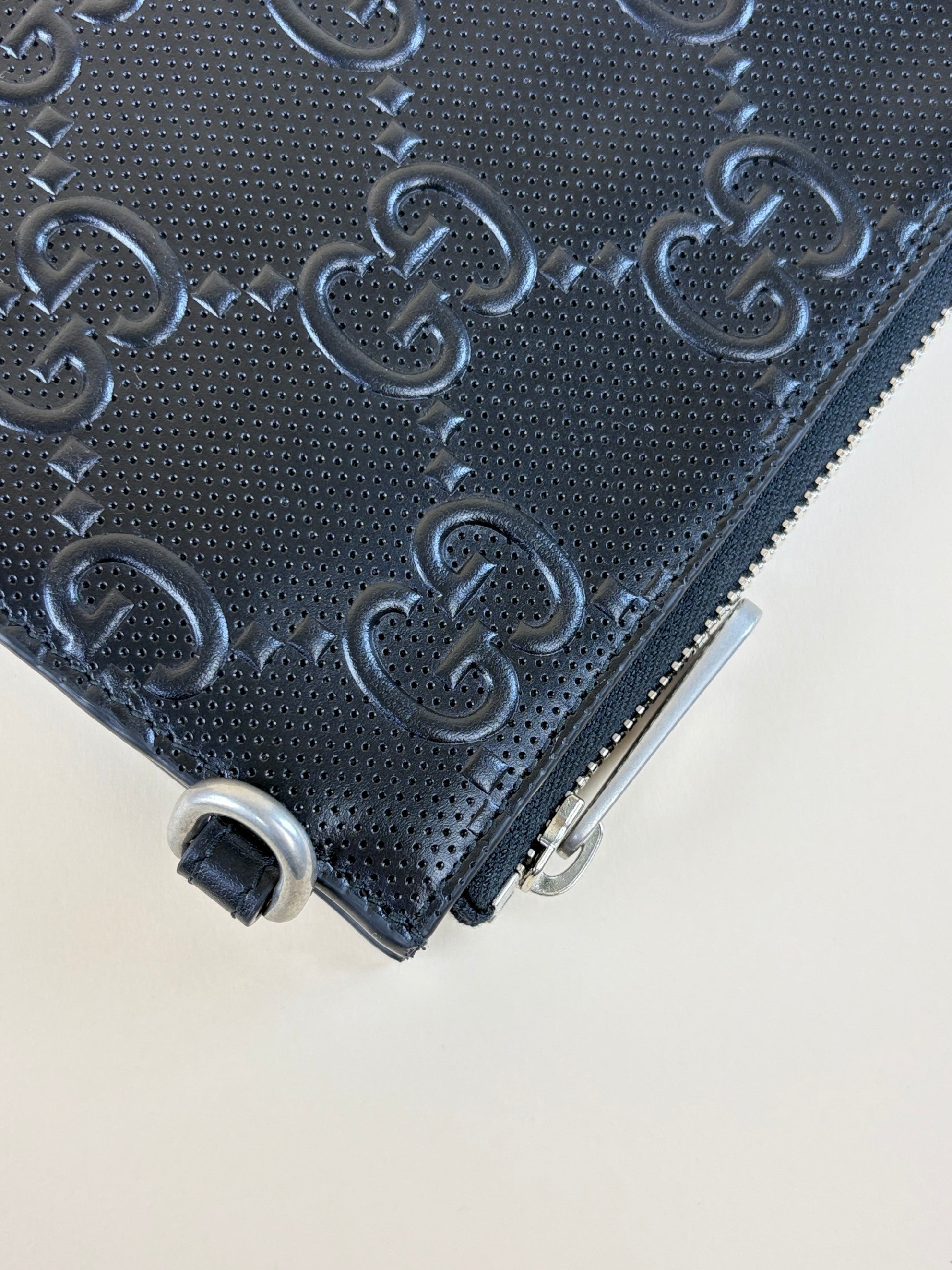 Gucci Black GG Tennis Embossed Wristlet Pouch