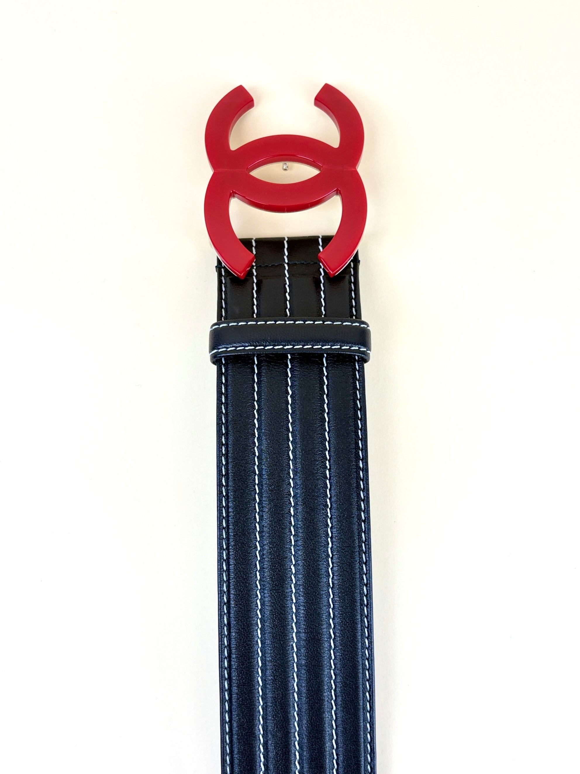 CHANEL black leather belt stitched red cc resin buckle logo