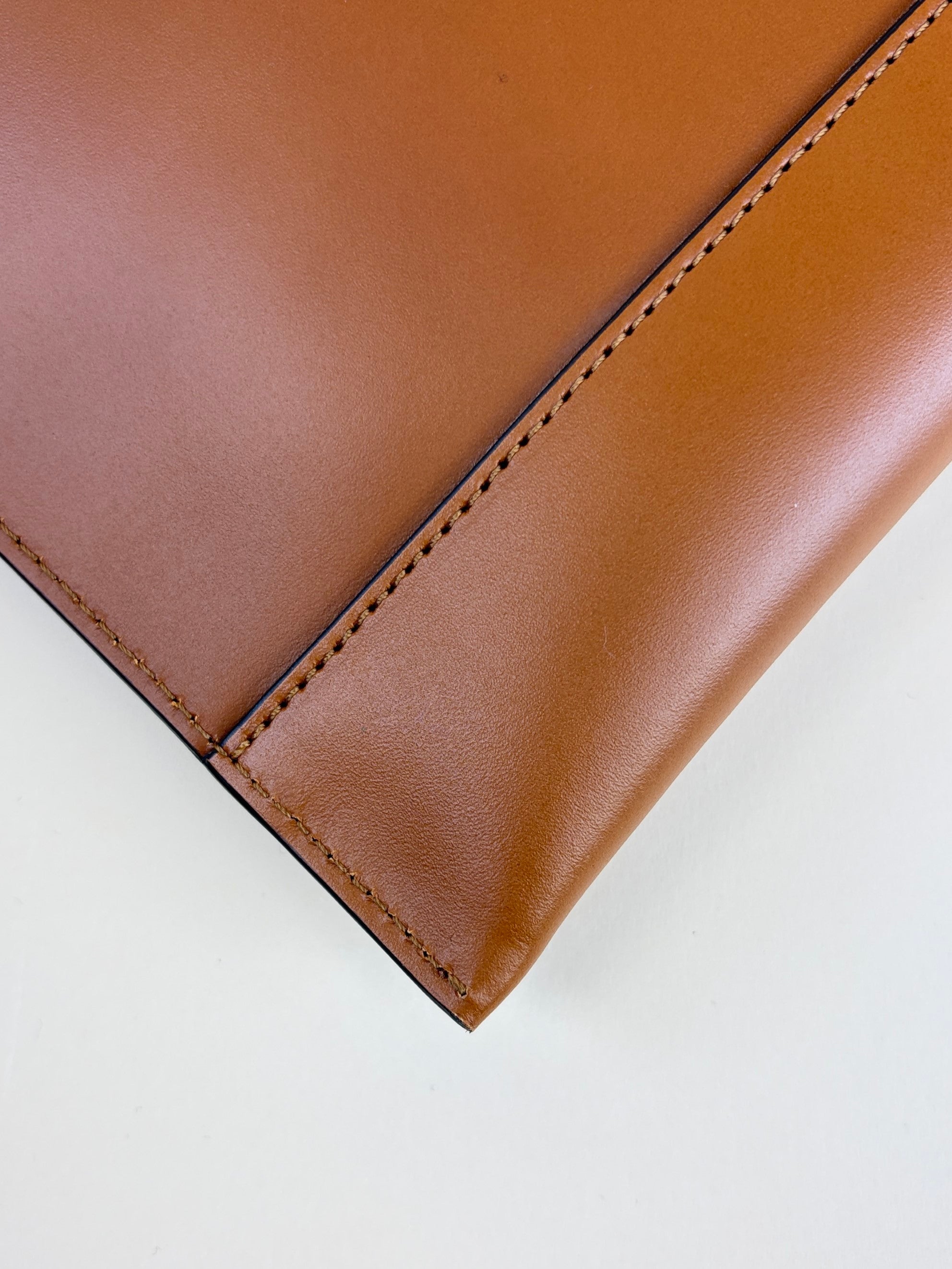 Fendi camel vitello kink Fendi roma logo embossed flat pouch