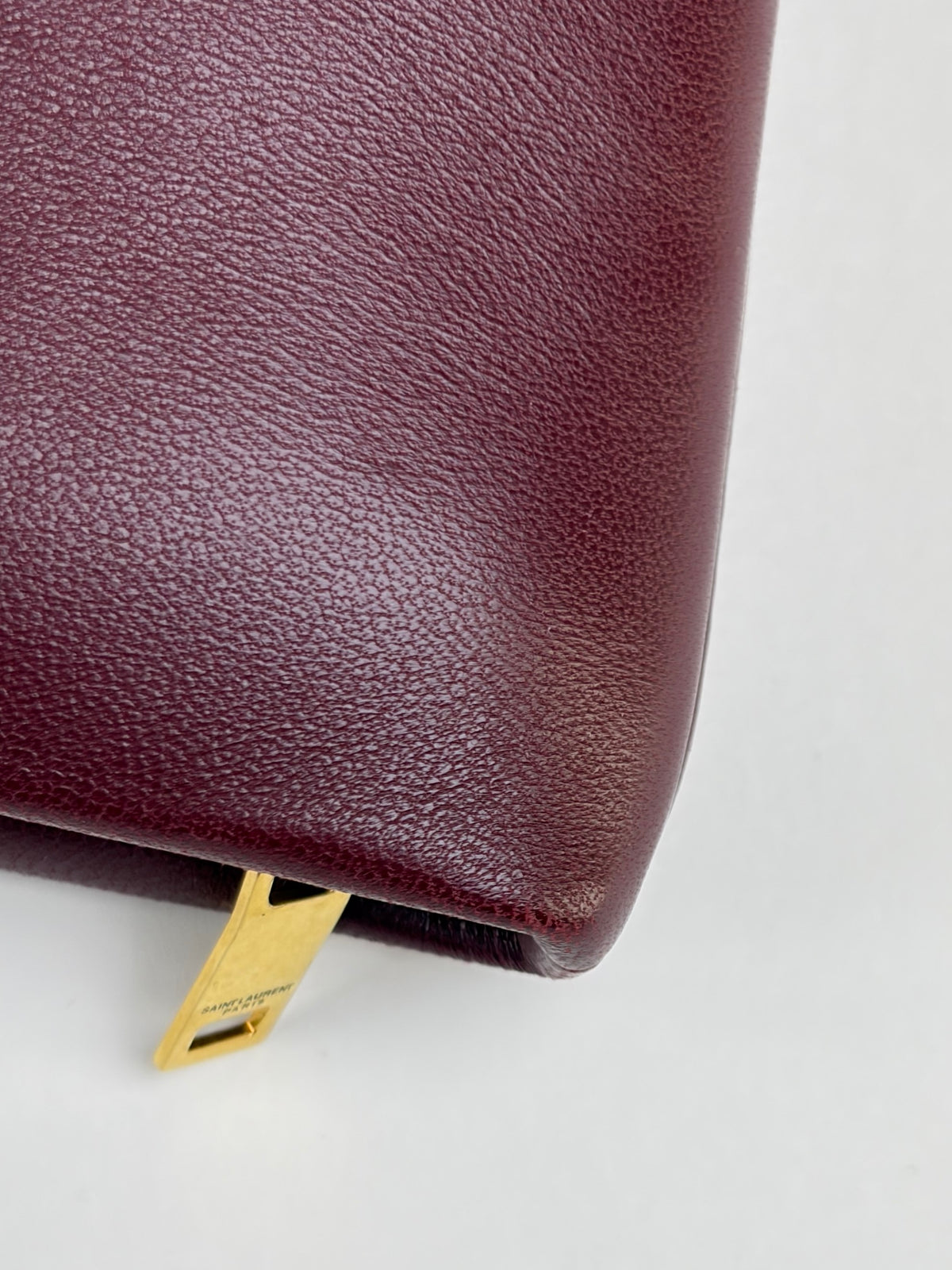 ysl burgundy calypso lambskin small zipped pouch