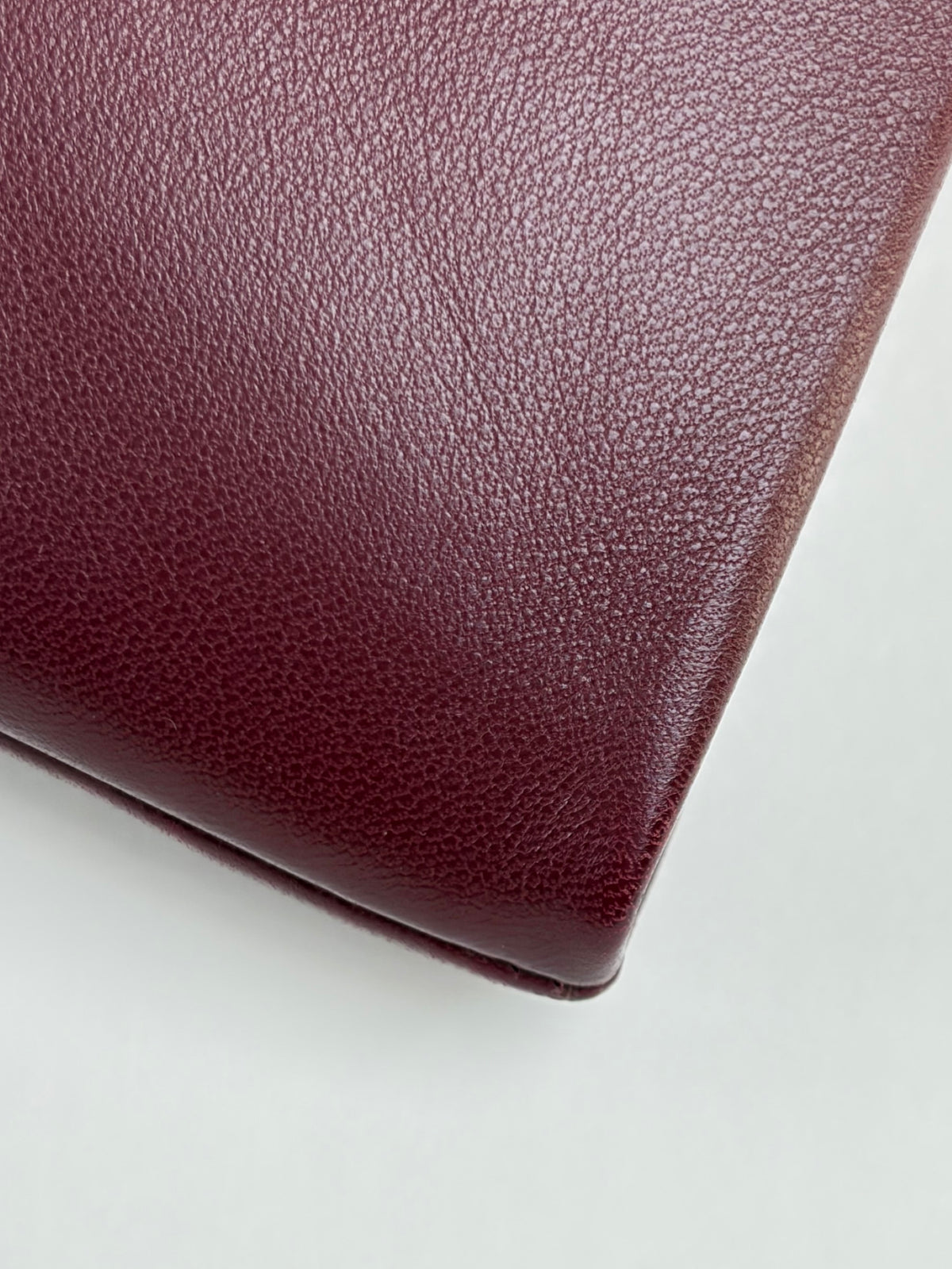 ysl burgundy calypso lambskin small zipped pouch