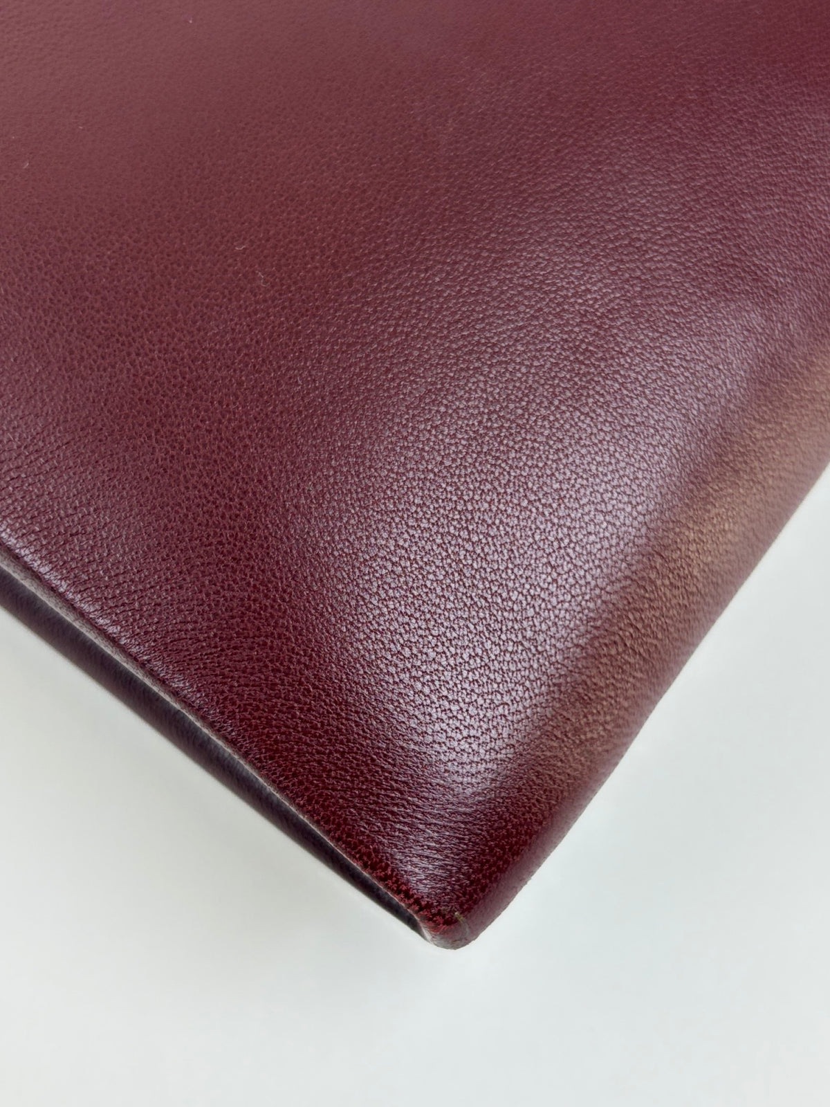 ysl burgundy calypso lambskin small zipped pouch