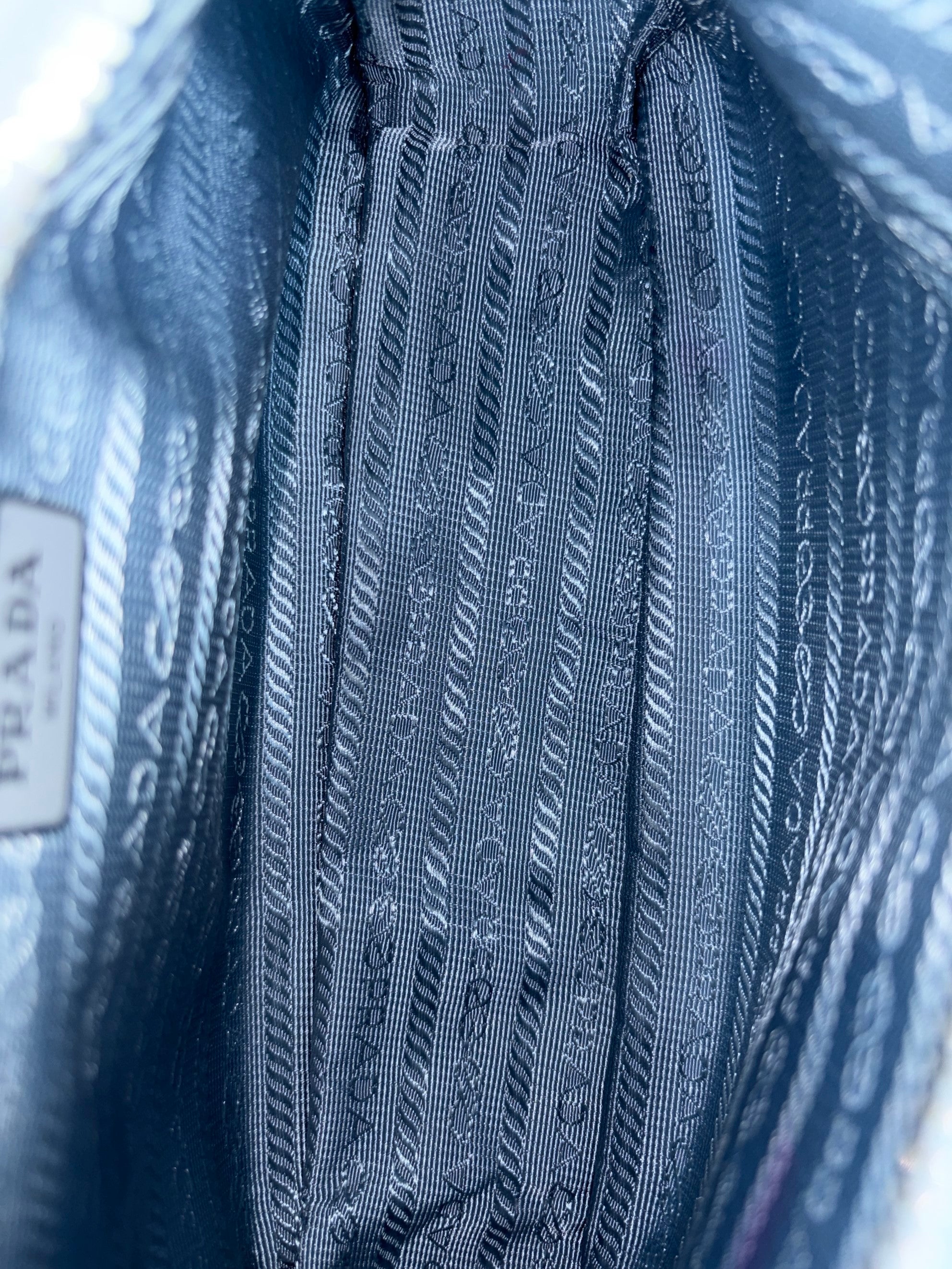 Prada baby blue nylon re-edition bag