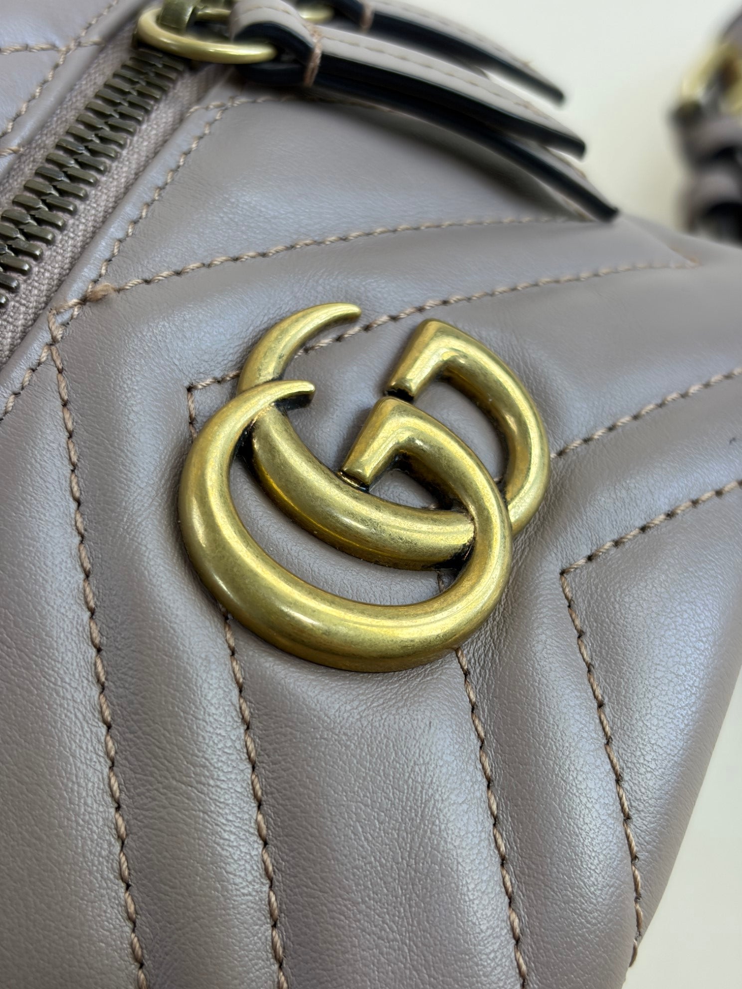 GUCCI nude calfskin matelassé mini gg Marmont round backpack bag