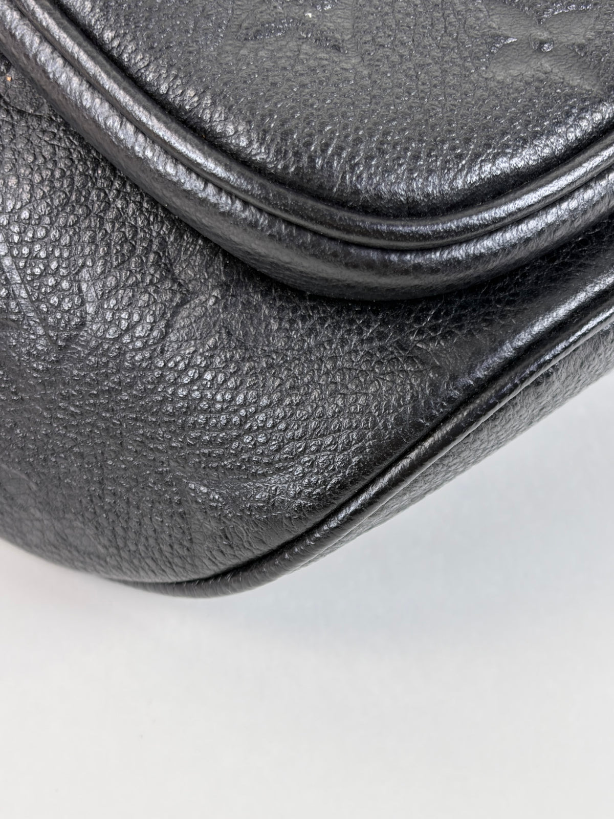 LOUIS VUITTON black monogram empreinte leather mini bumbag