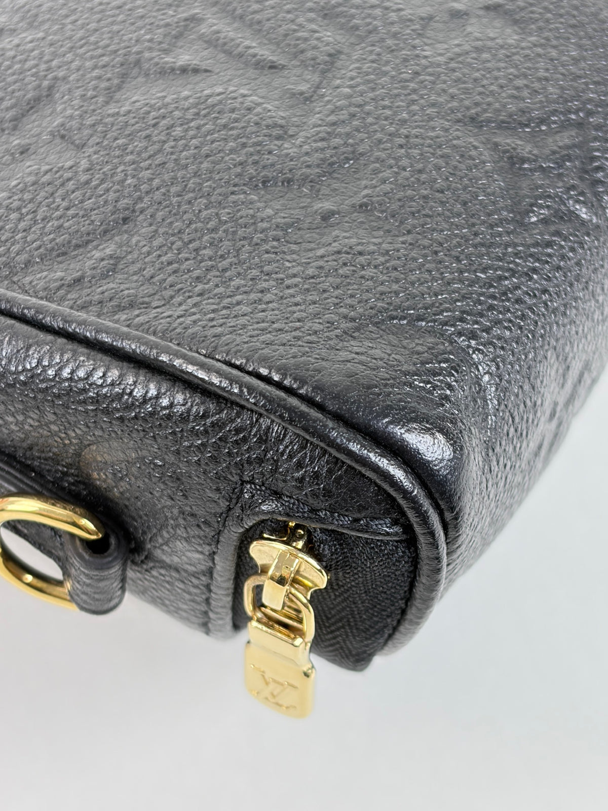 LOUIS VUITTON black monogram empreinte leather mini bumbag