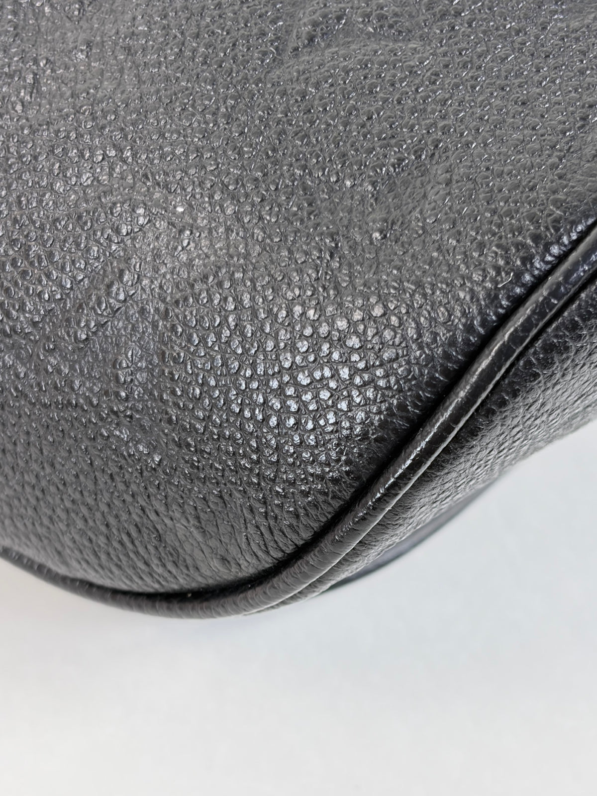 LOUIS VUITTON black monogram empreinte leather mini bumbag