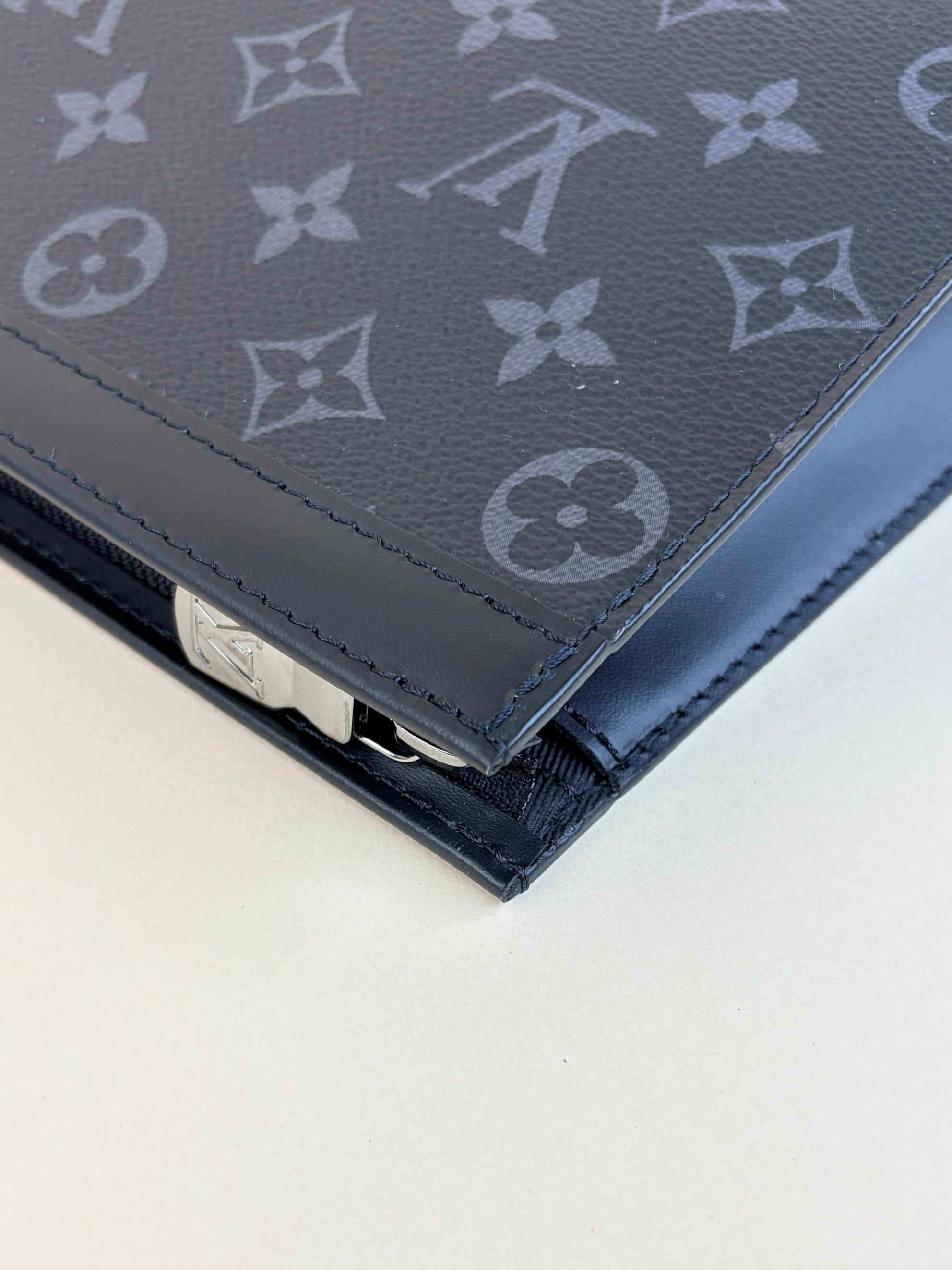 louis Vuitton monogram eclipse voyage mm pochette