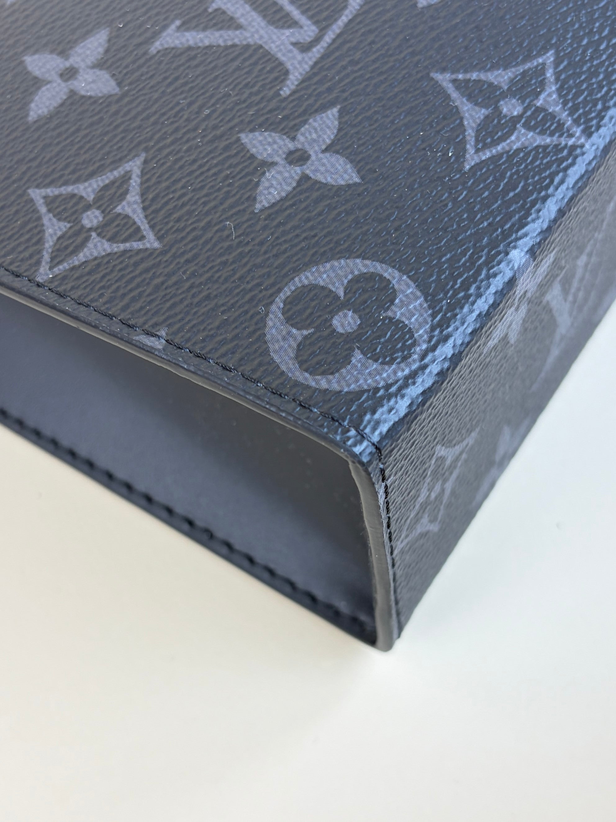 louis Vuitton monogram eclipse voyage mm pochette