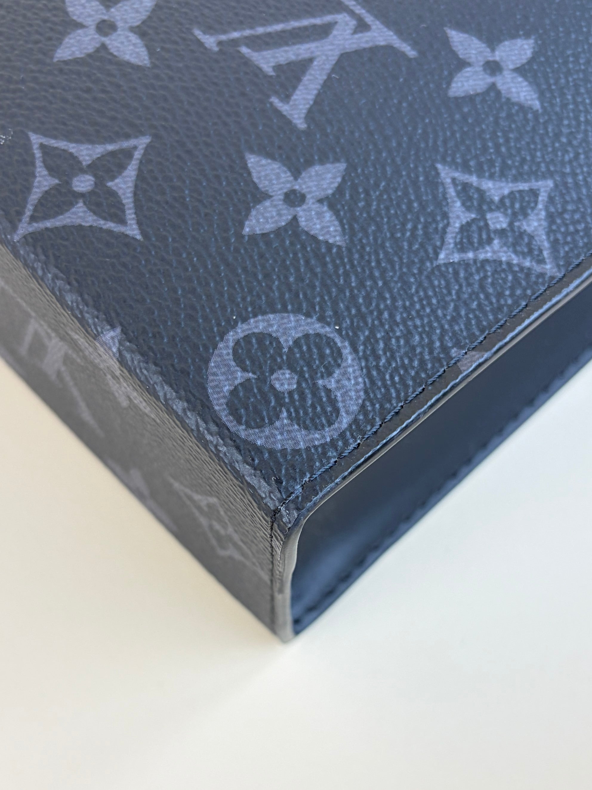 louis Vuitton monogram eclipse voyage mm pochette