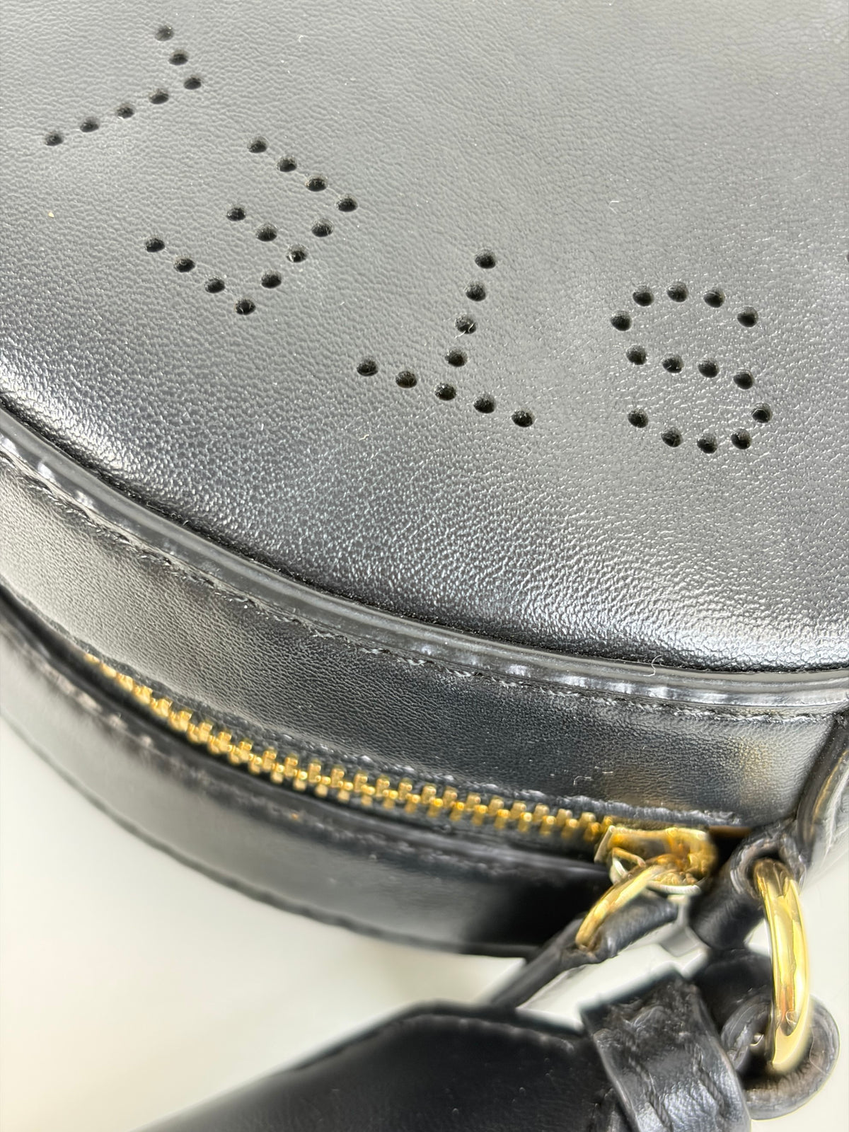 Stella Mccartney black mini round LOGO cross body bag