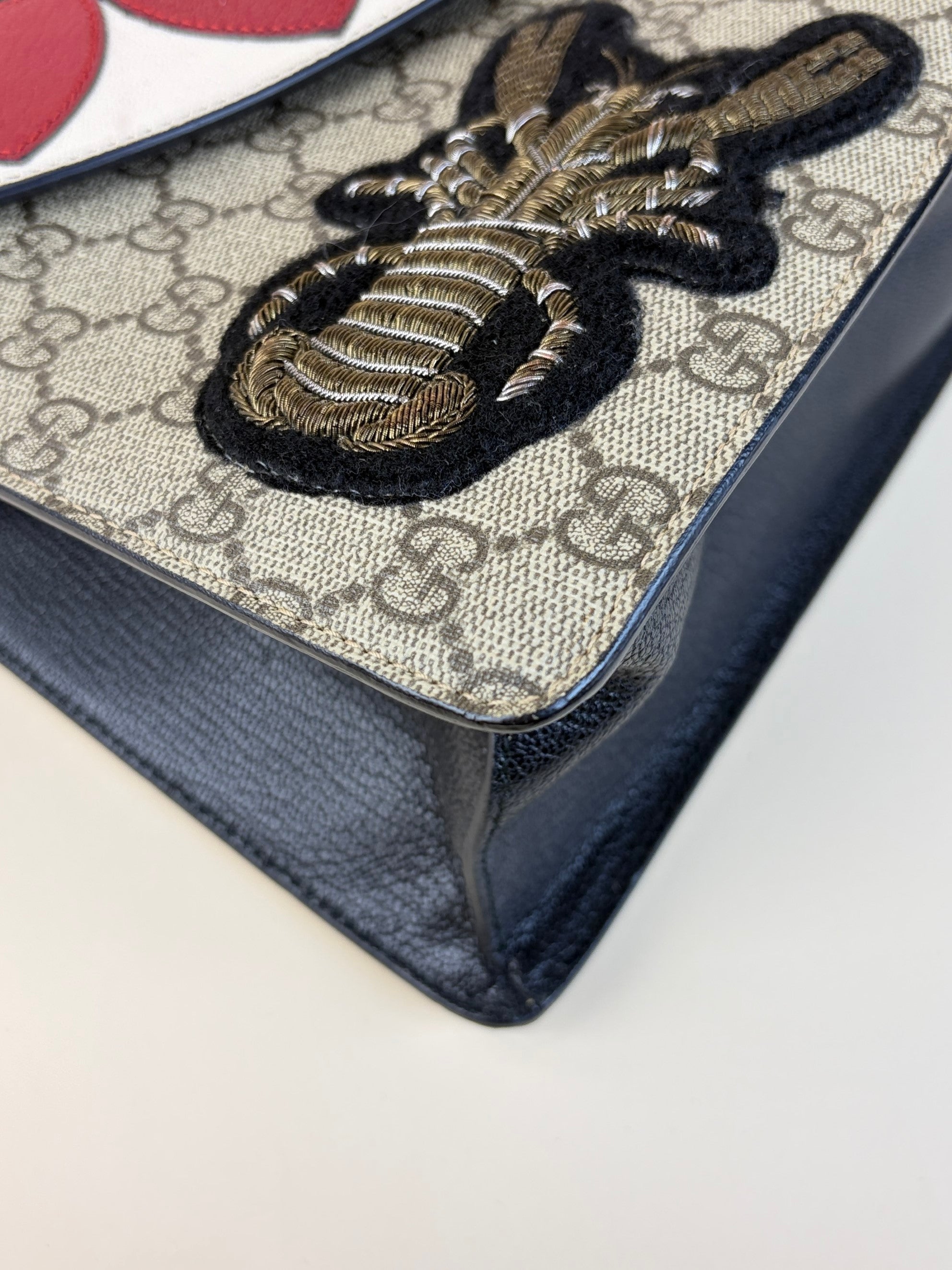 Gucci gg supreme medium monogram goat skin pearl fox brioche