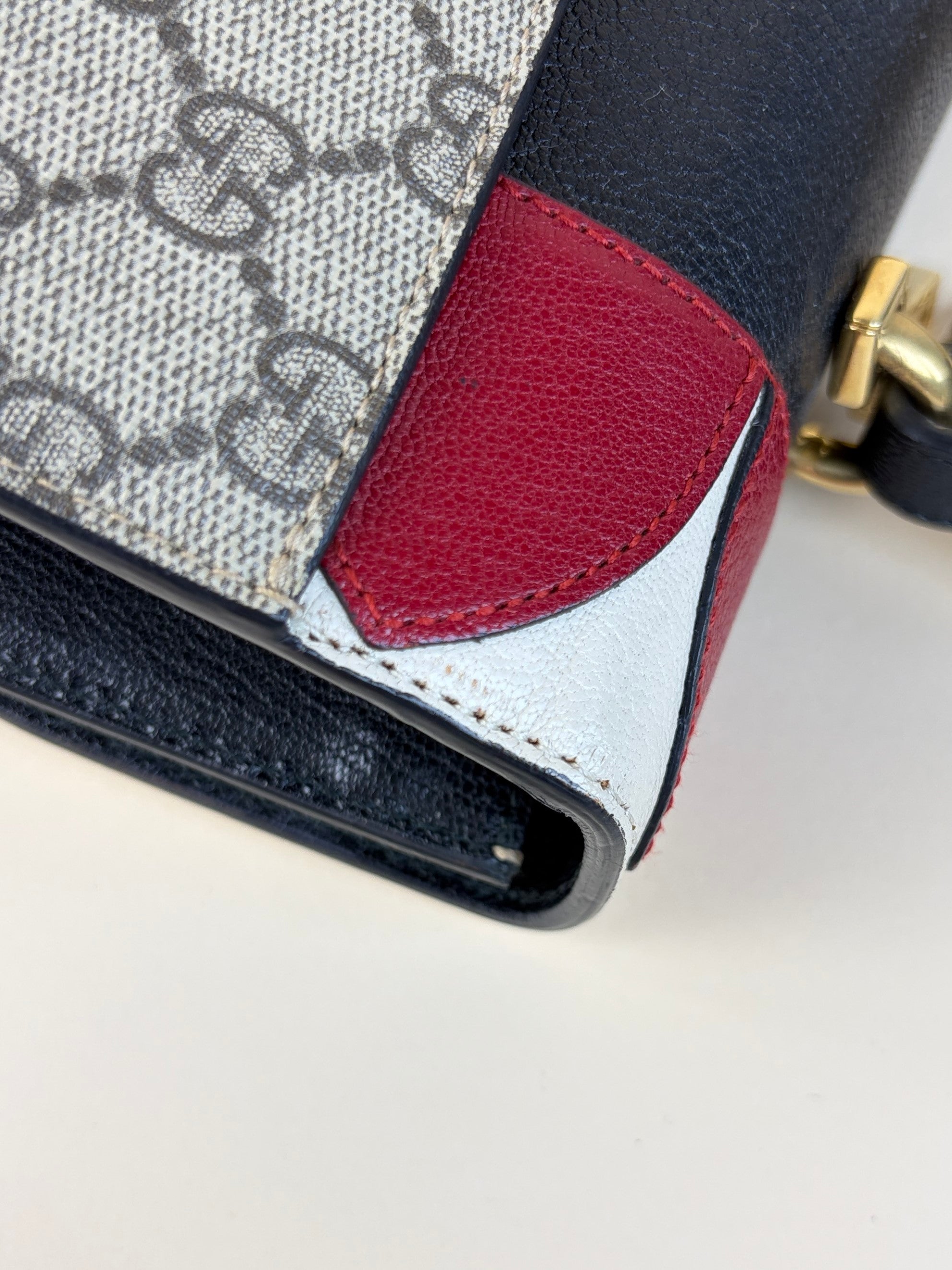 Gucci gg supreme medium monogram goat skin pearl fox brioche