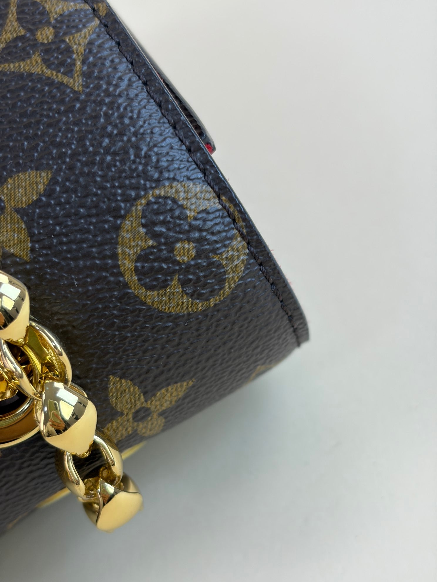 Louis Vuitton Monogram red flap Victoire Bag
