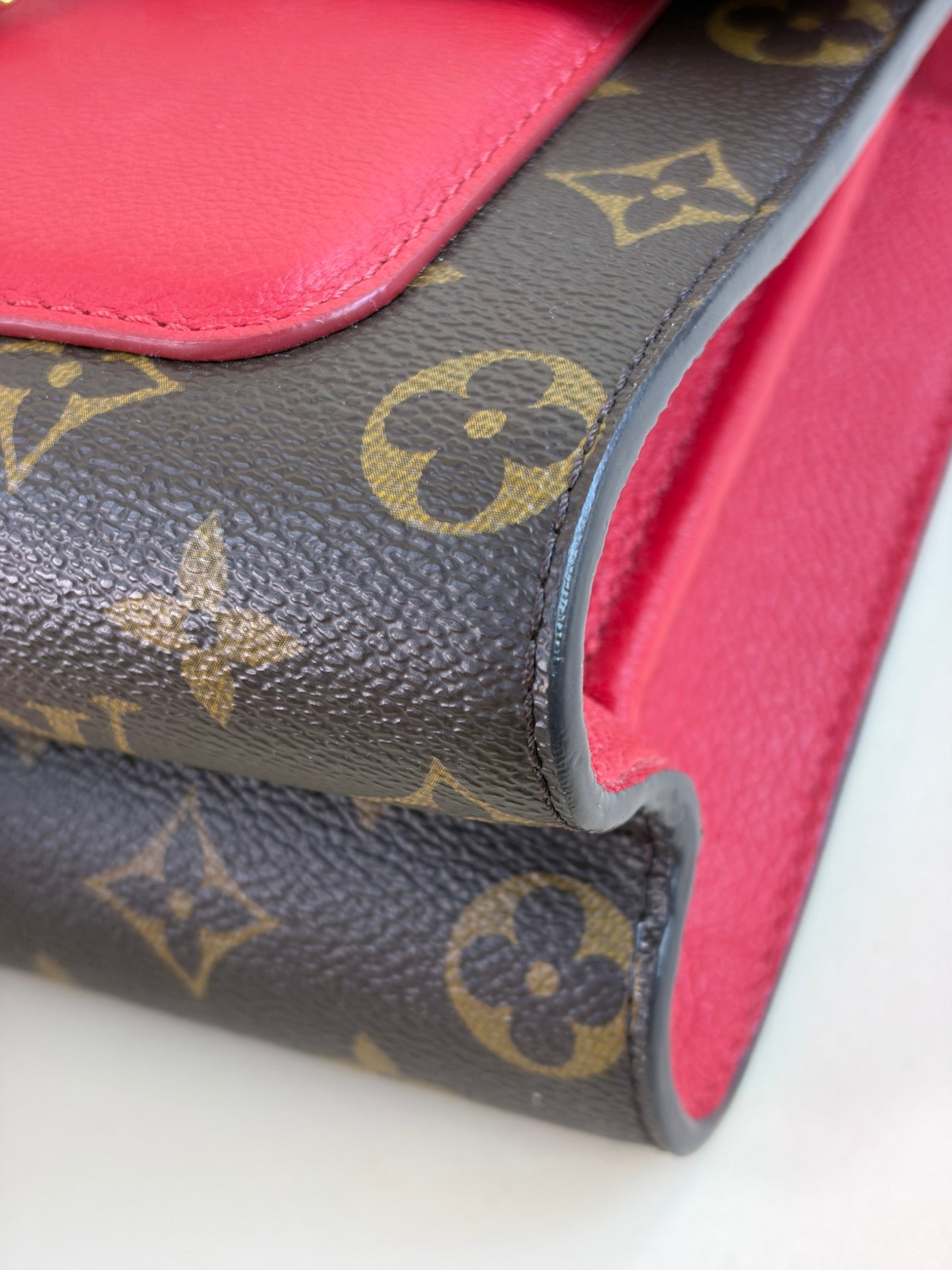 Louis Vuitton Monogram red flap Victoire Bag