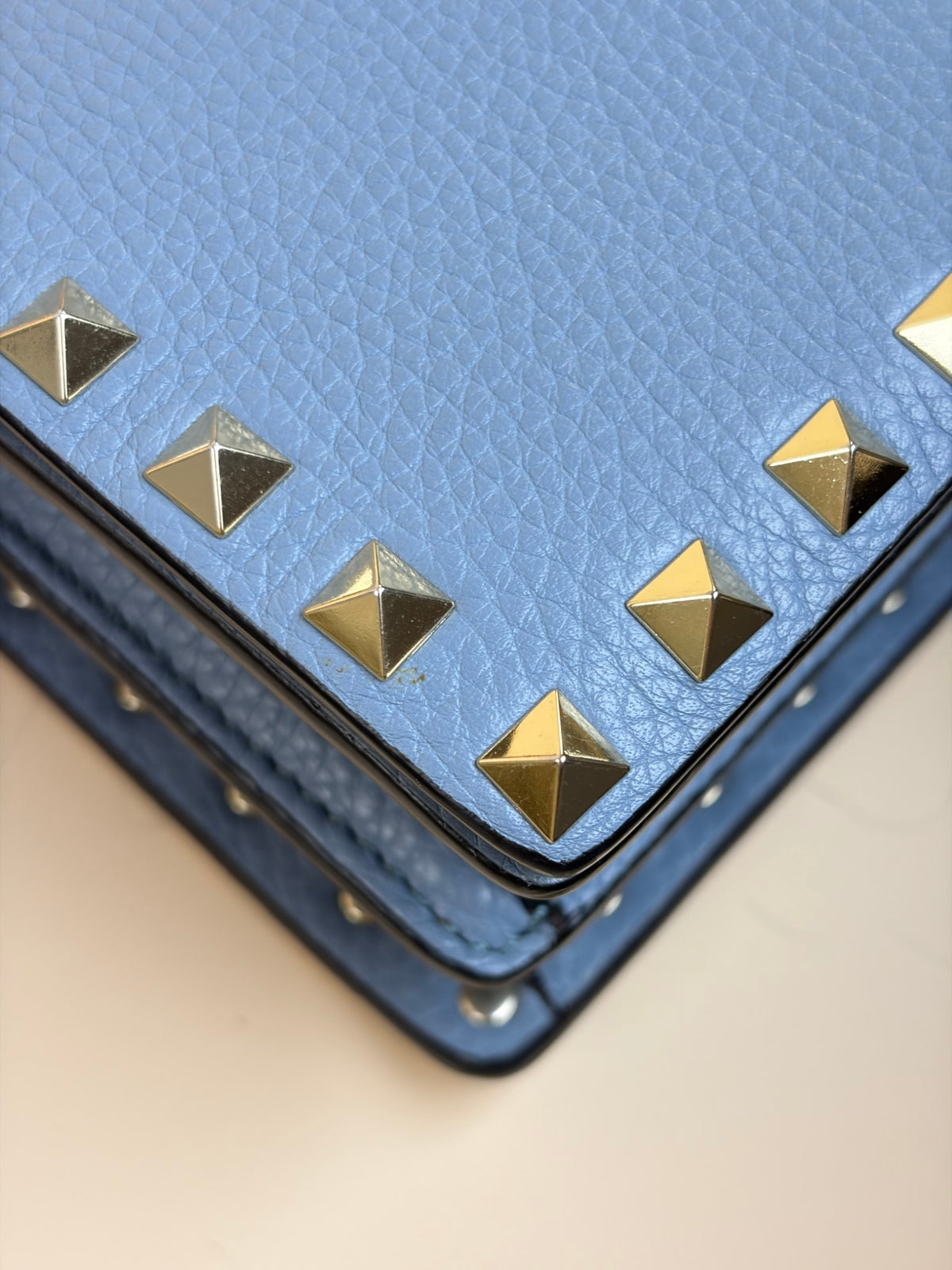 Valentino pebbled calfskin rock stud wallet on chain light blue