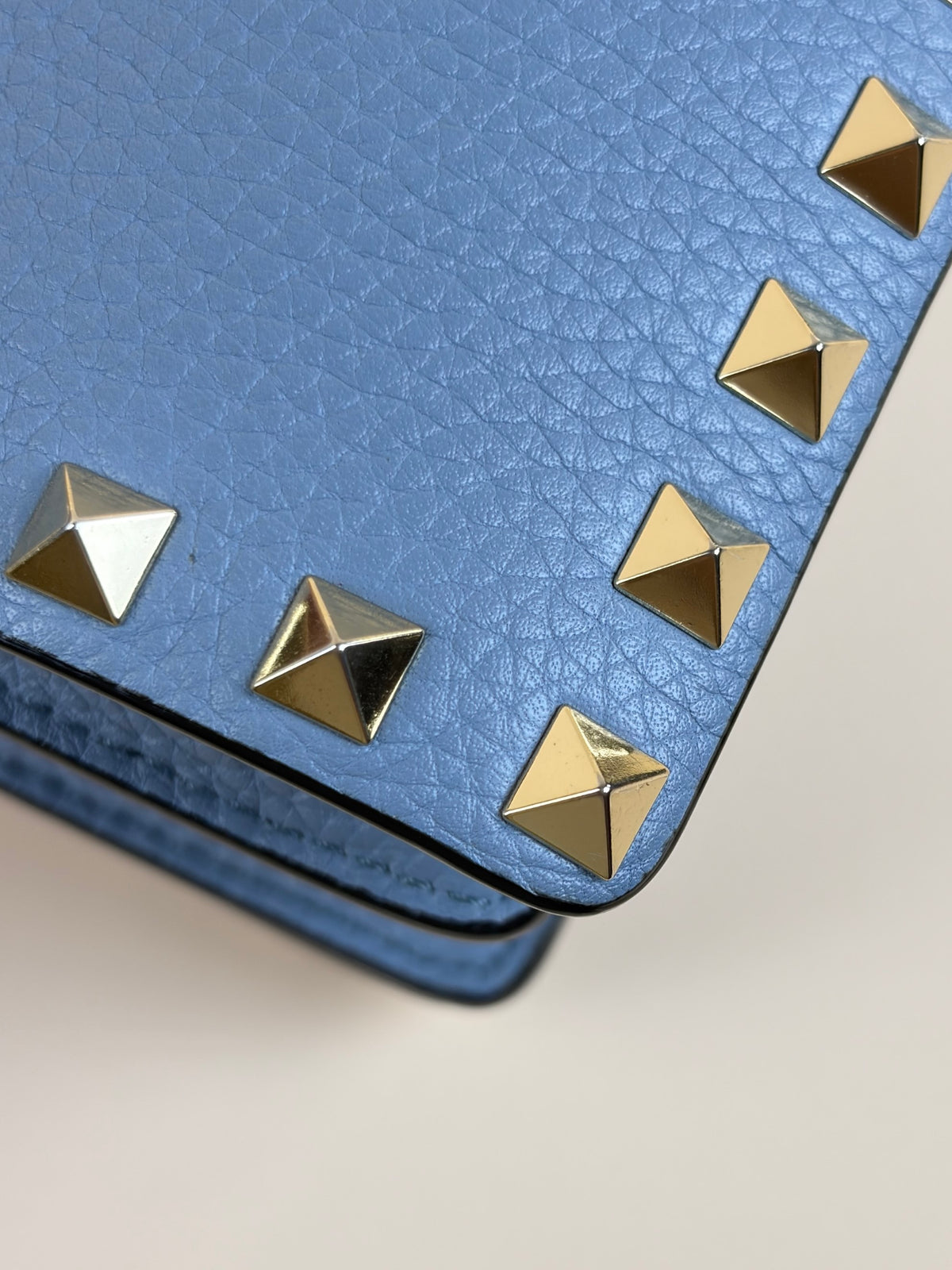Valentino pebbled calfskin rock stud wallet on chain light blue