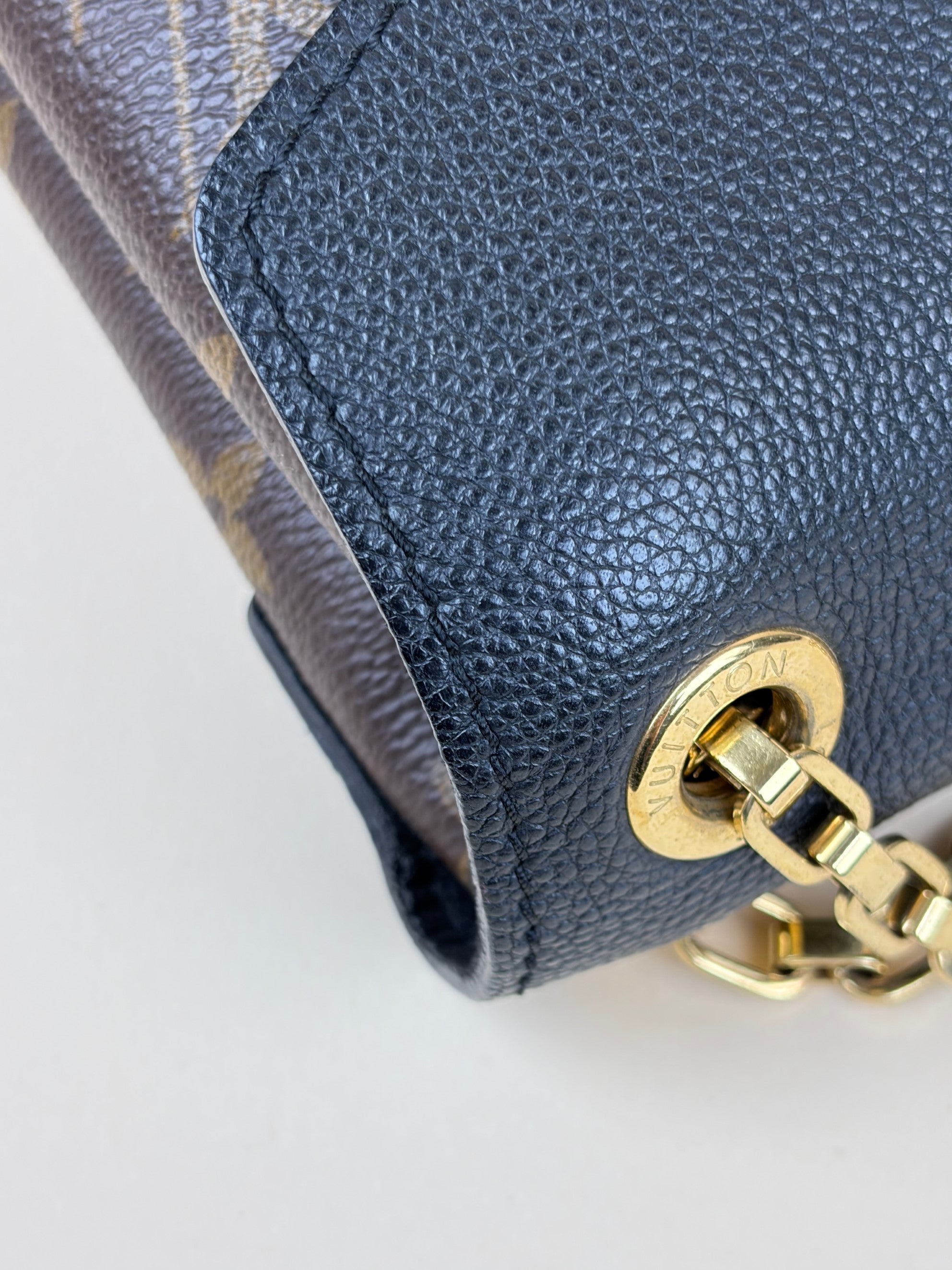 Louis Vuitton canvas and black calfskin Pallas chain