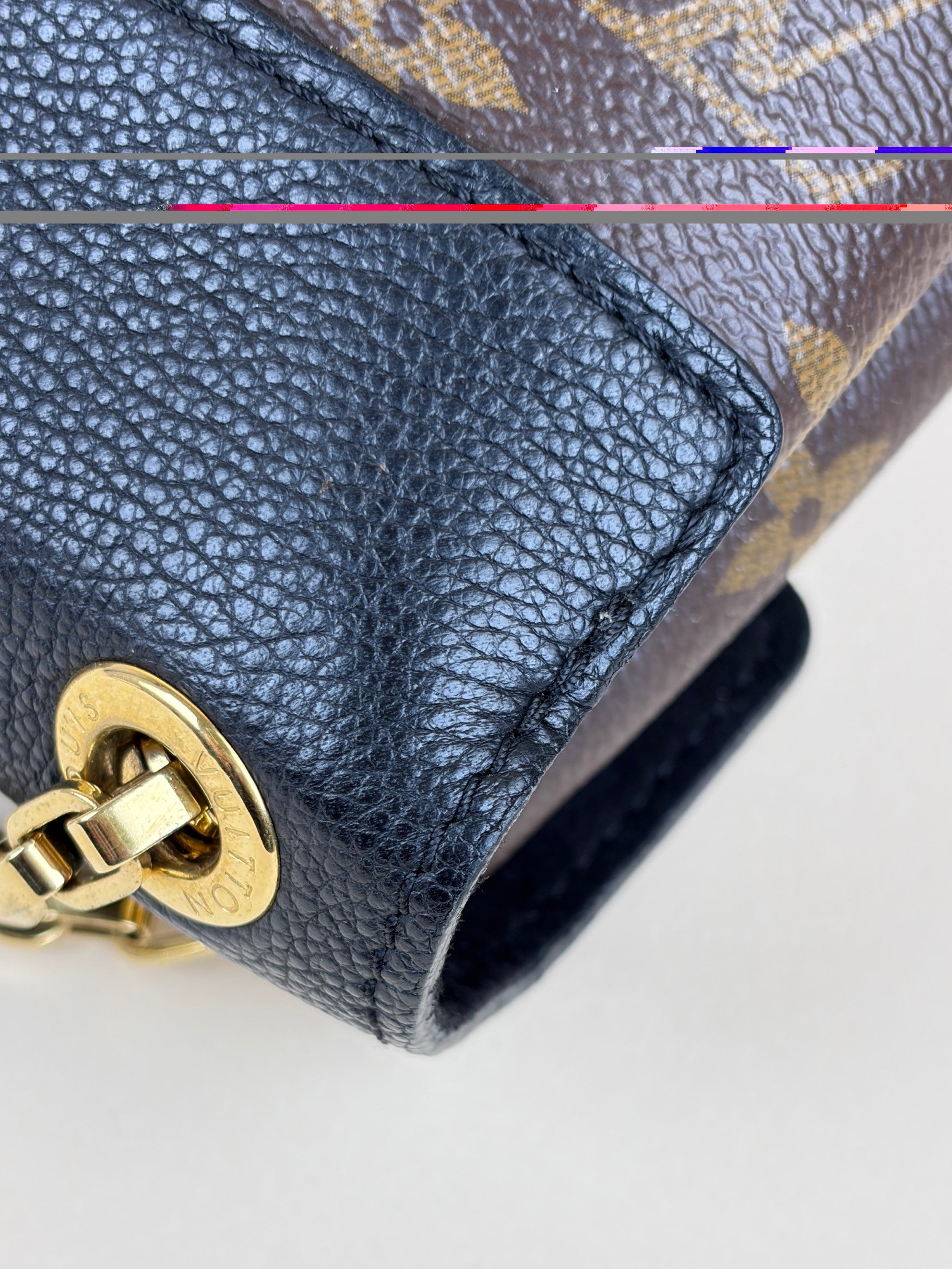 Louis Vuitton canvas and black calfskin Pallas chain