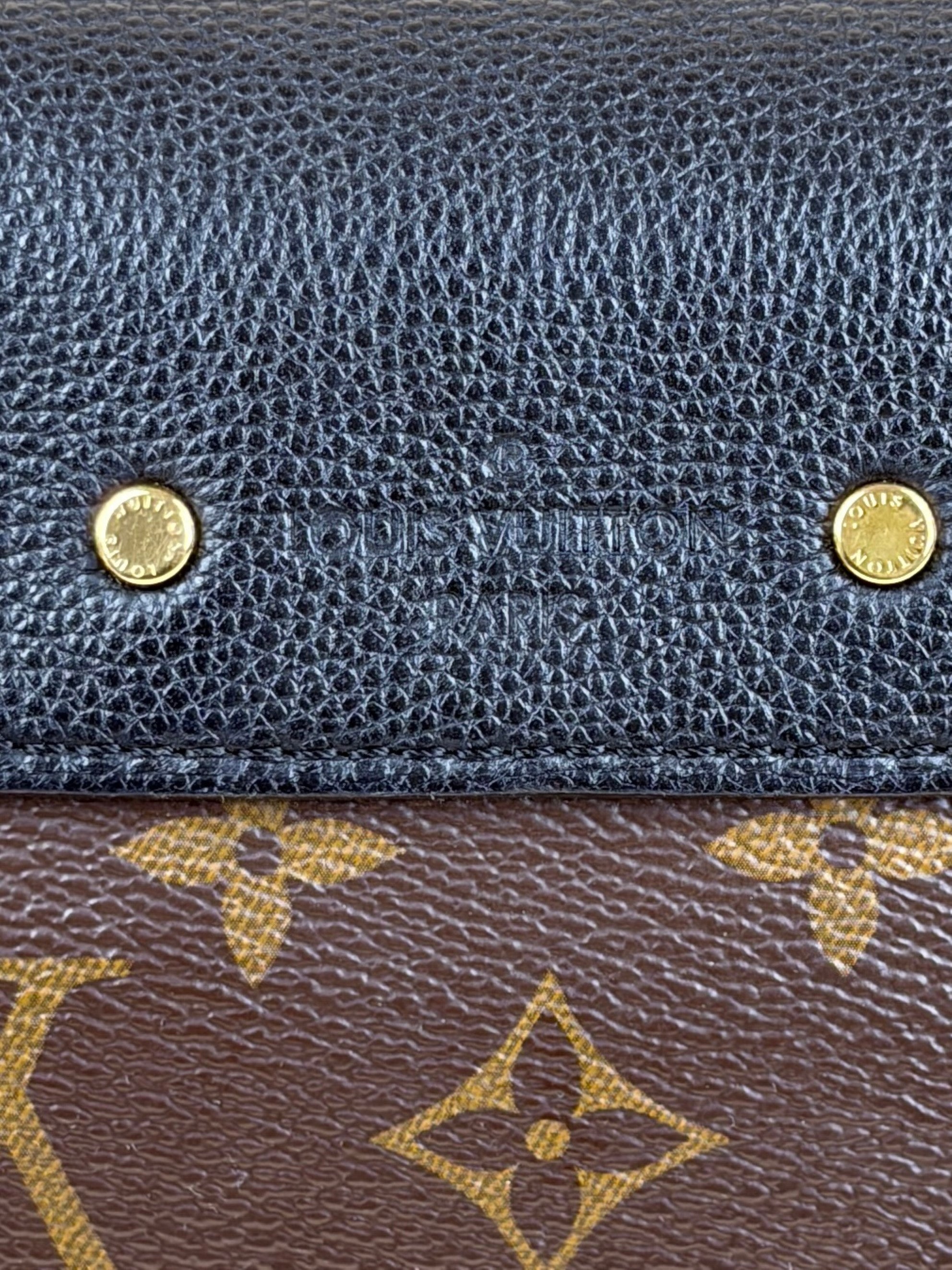 Louis Vuitton canvas and black calfskin Pallas chain