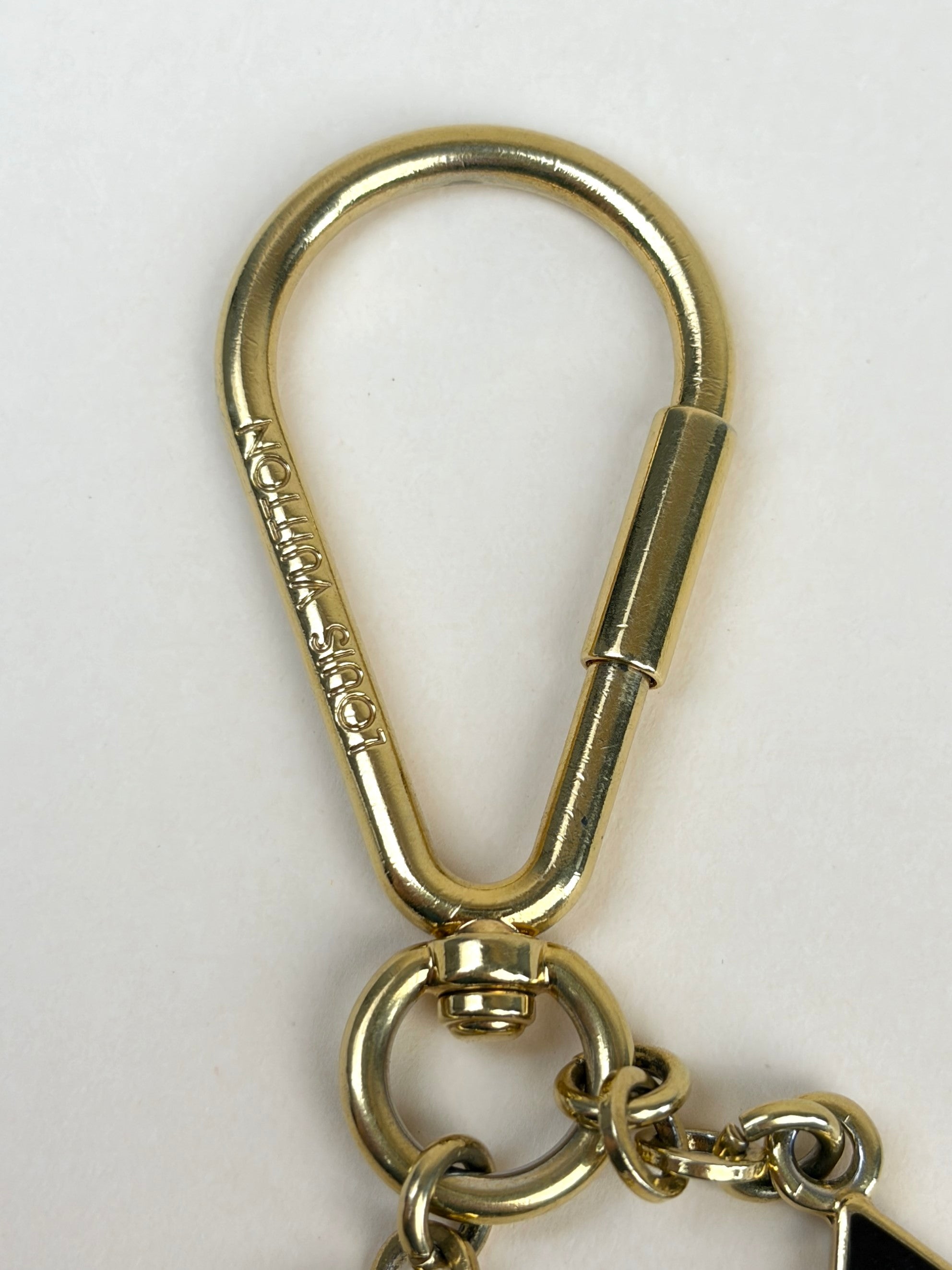 LOUIS VUITTON brown /gold puzzle key ring bag charm