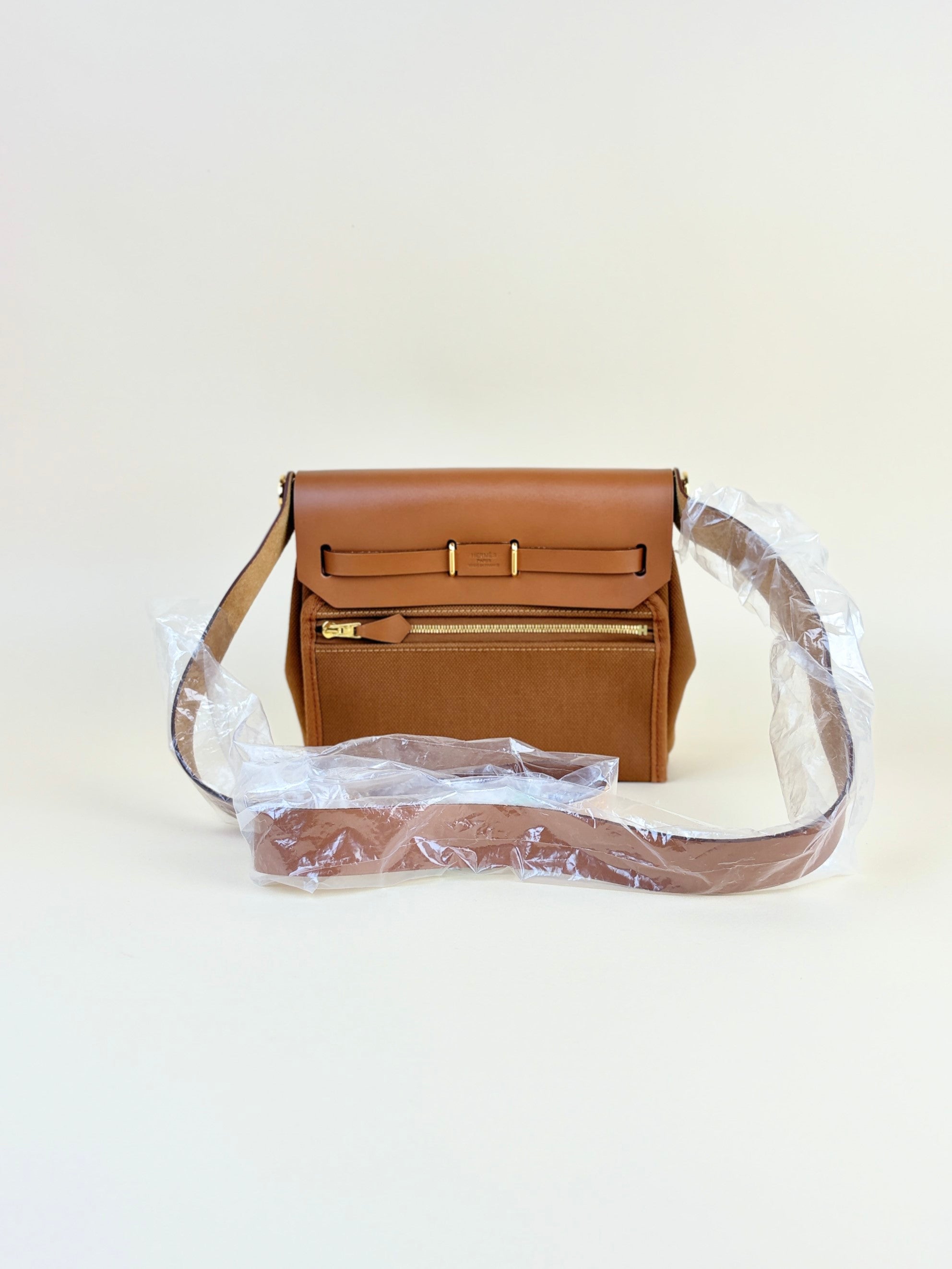 Hermes gold/fauve canvas and Vache hunter leather herbage zip20 mini bag