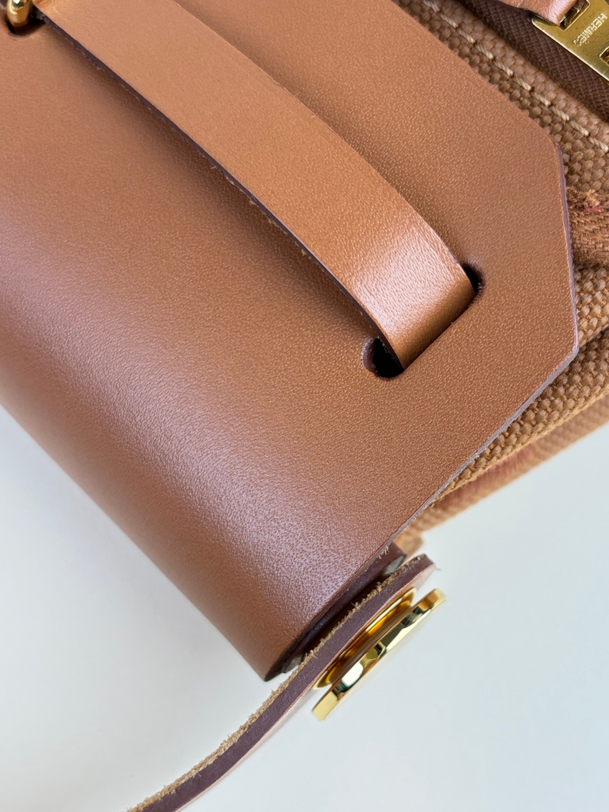 Hermes gold/fauve canvas and Vache hunter leather herbage zip20 mini bag