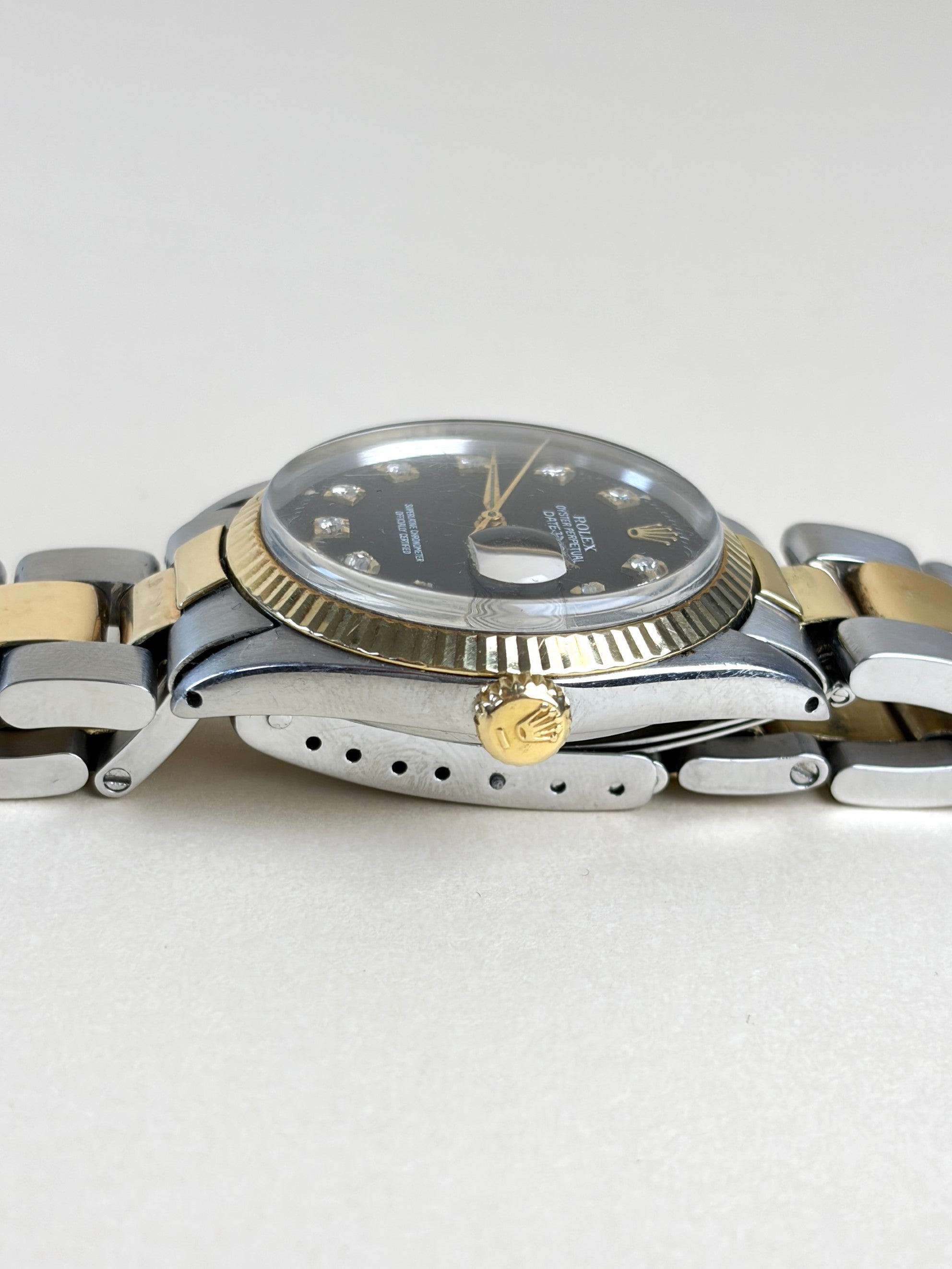Rolex  date just 36 with a black dial & diamonds