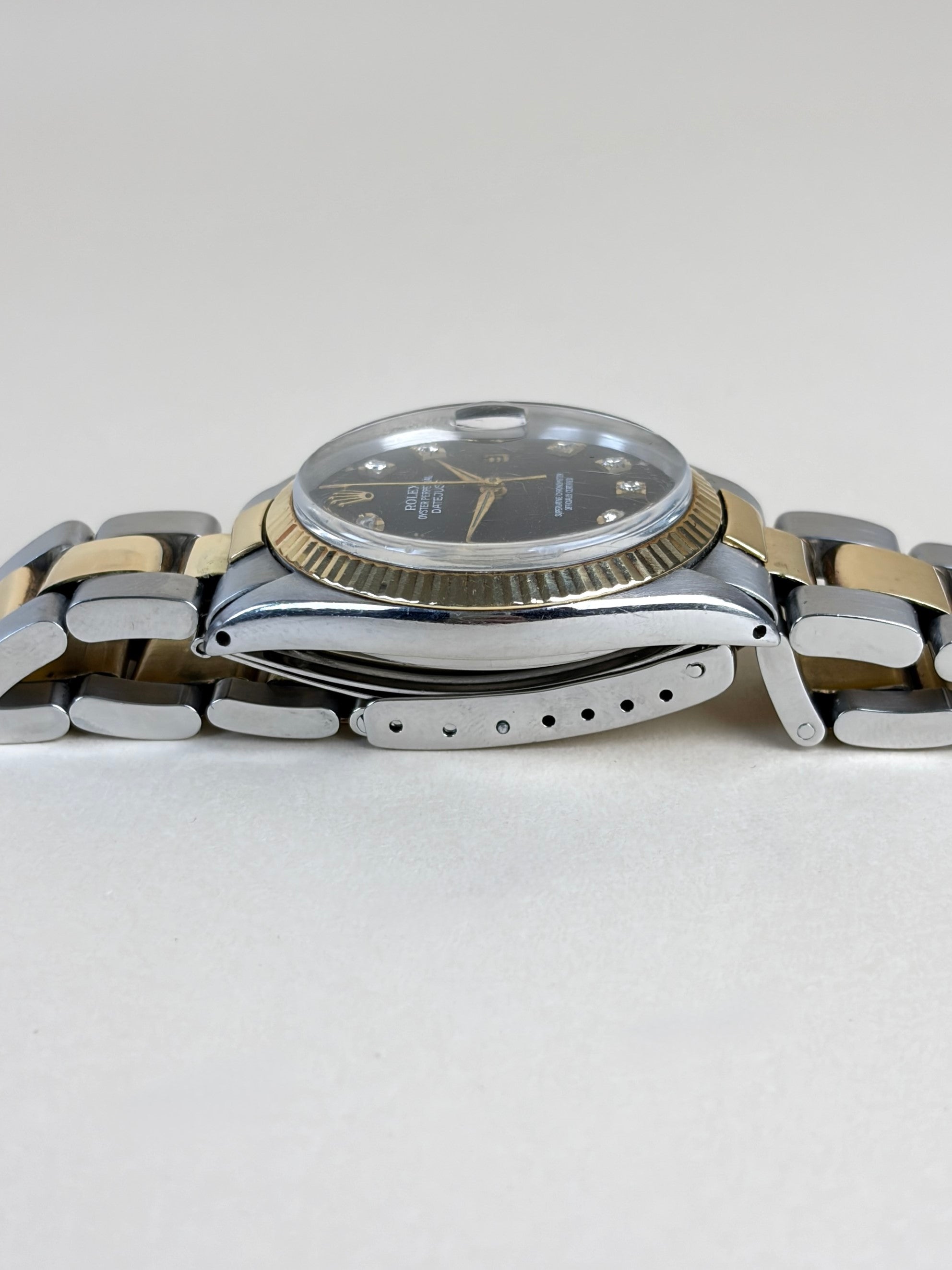 Rolex  date just 36 with a black dial & diamonds