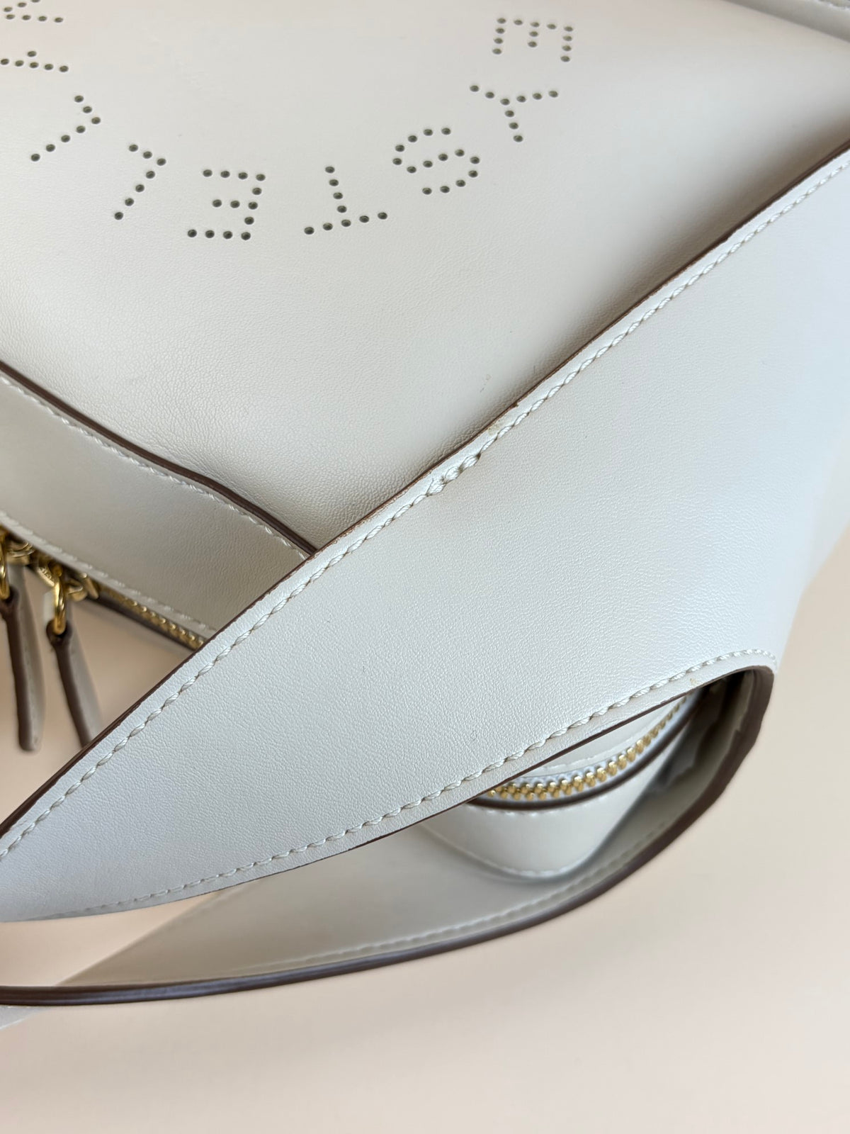 Stella Mccartney off white leather logo cross body